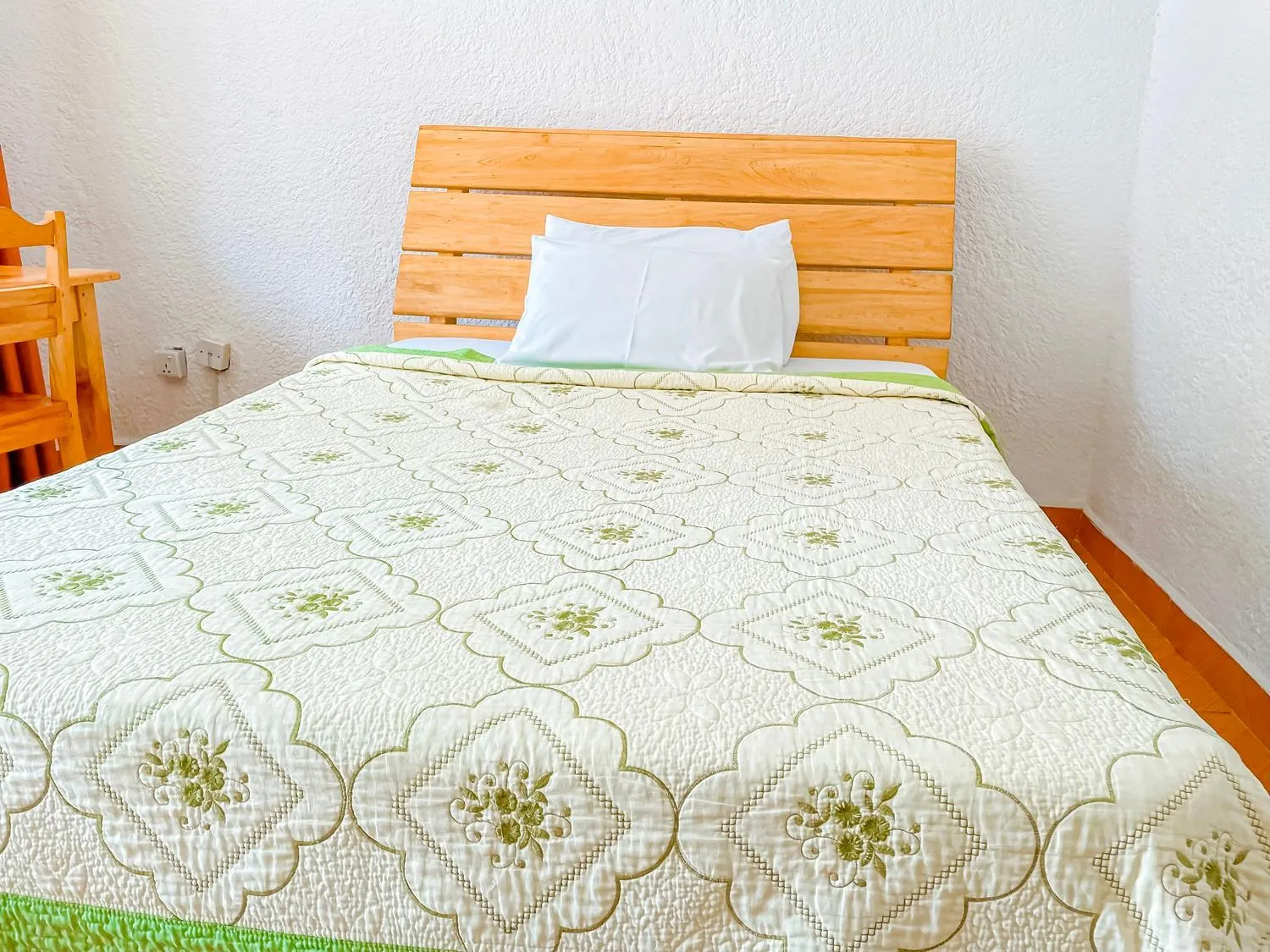 Bed in Musanto Hotel