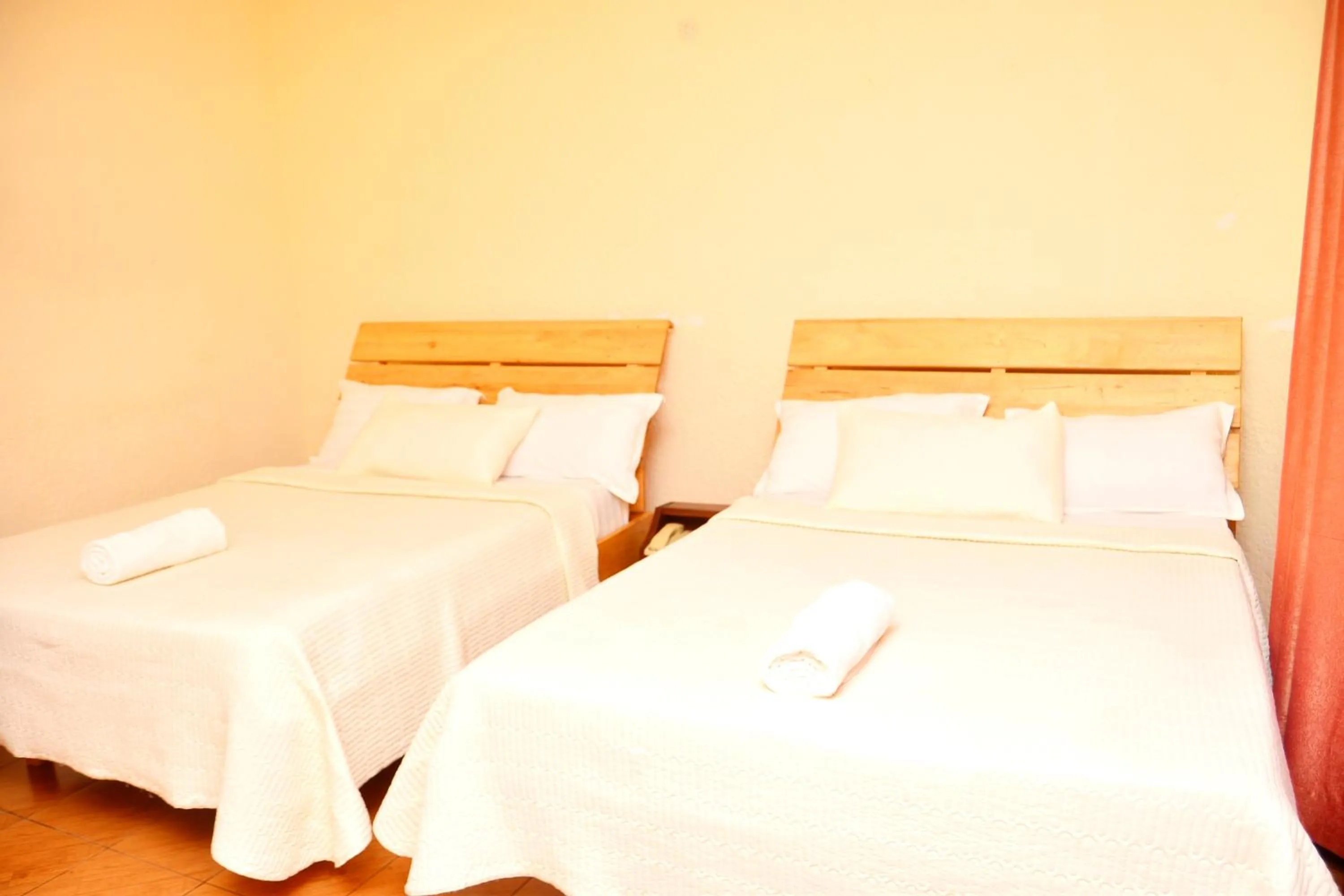 Bed in Musanto Hotel