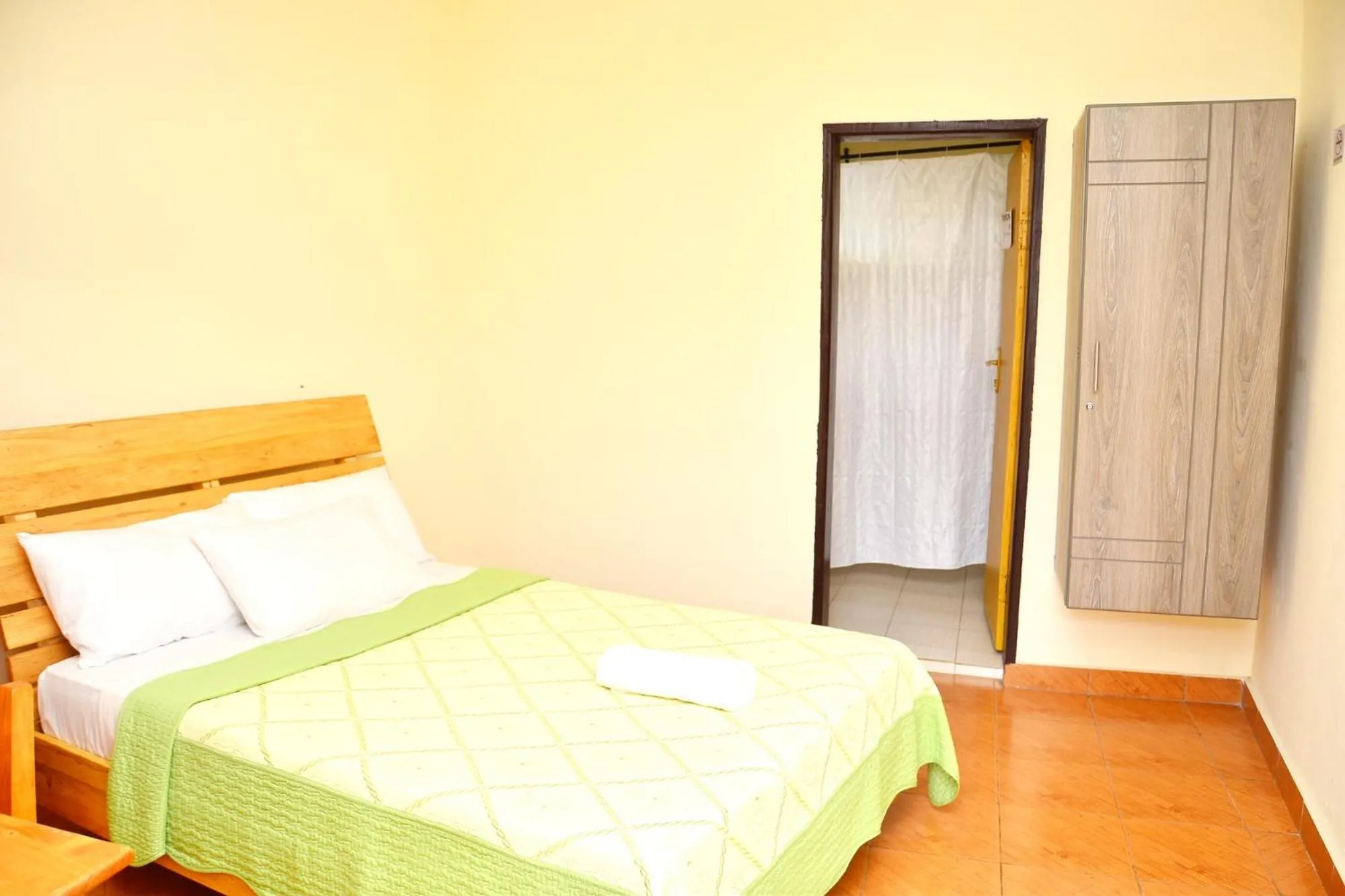 Bed in Musanto Hotel