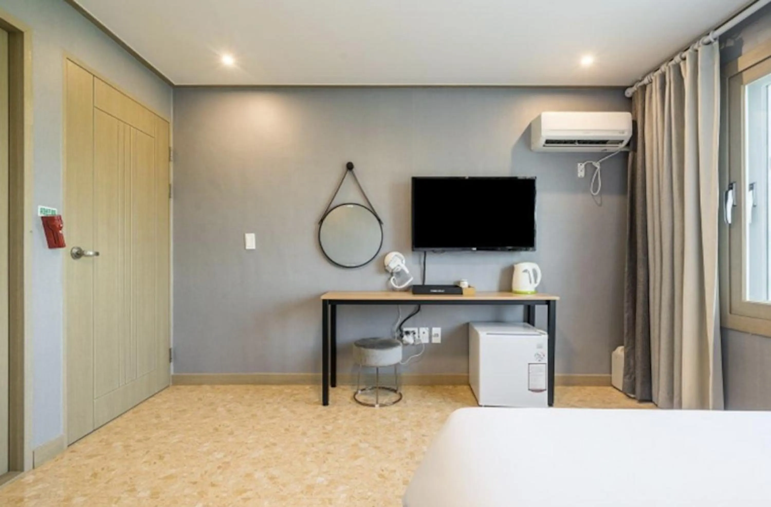 Bed in Jeju Pure Stay Ocean