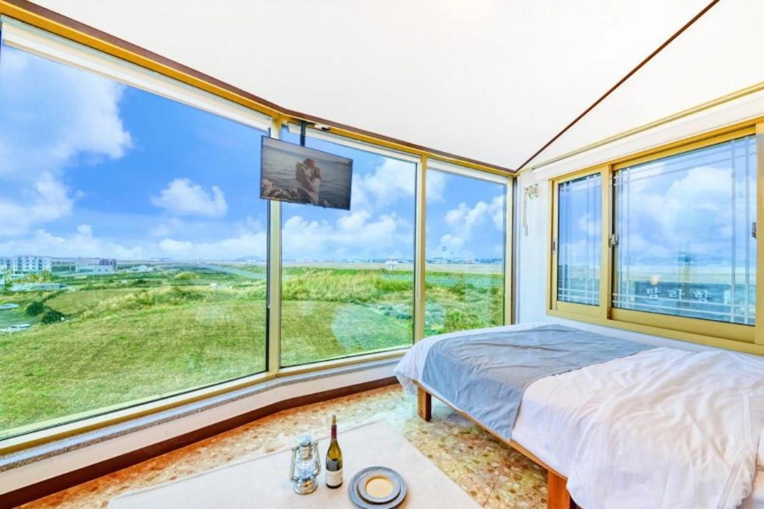 Bed in Jeju Pure Stay Ocean