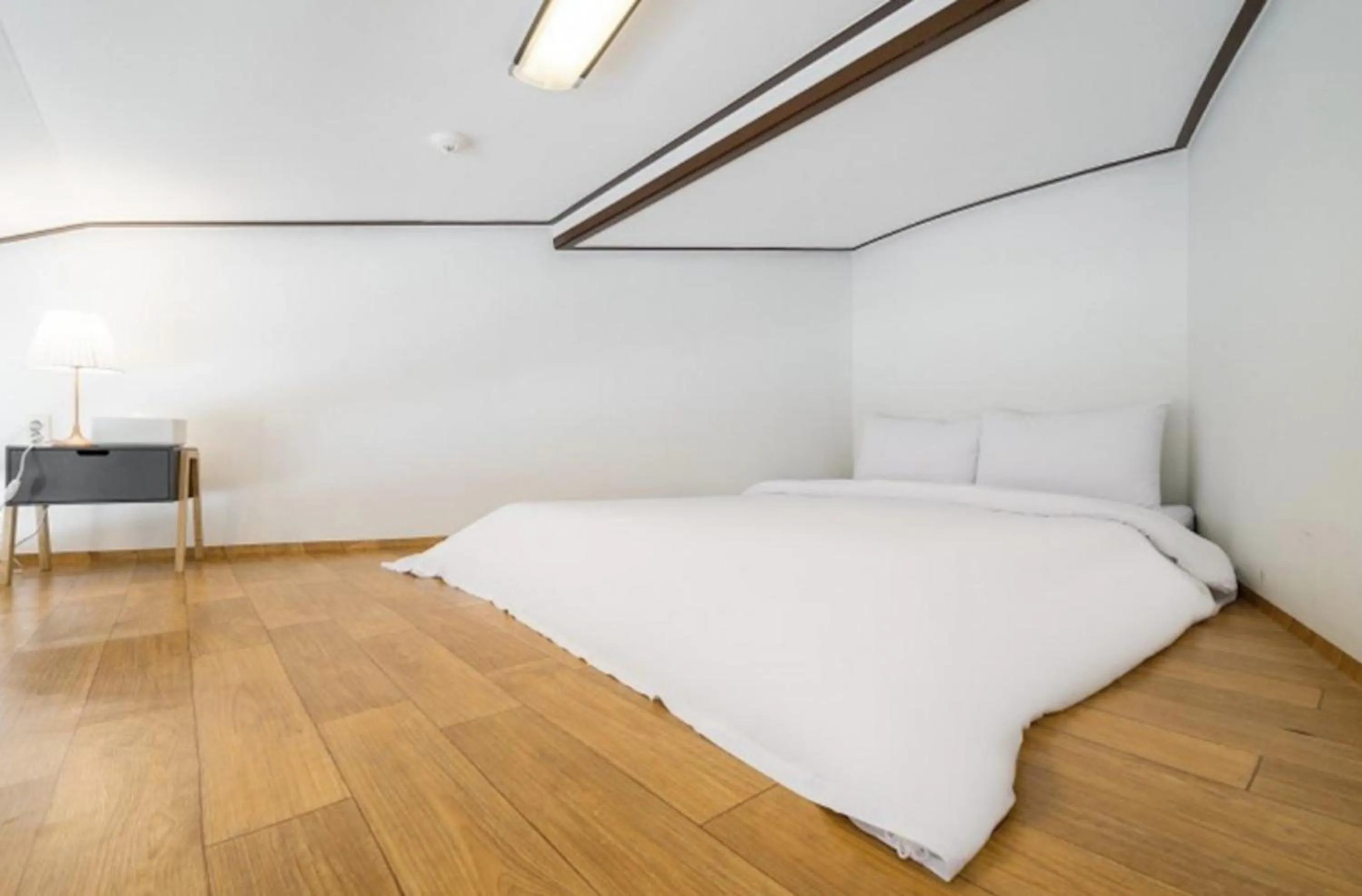 Bed in Jeju Pure Stay Ocean