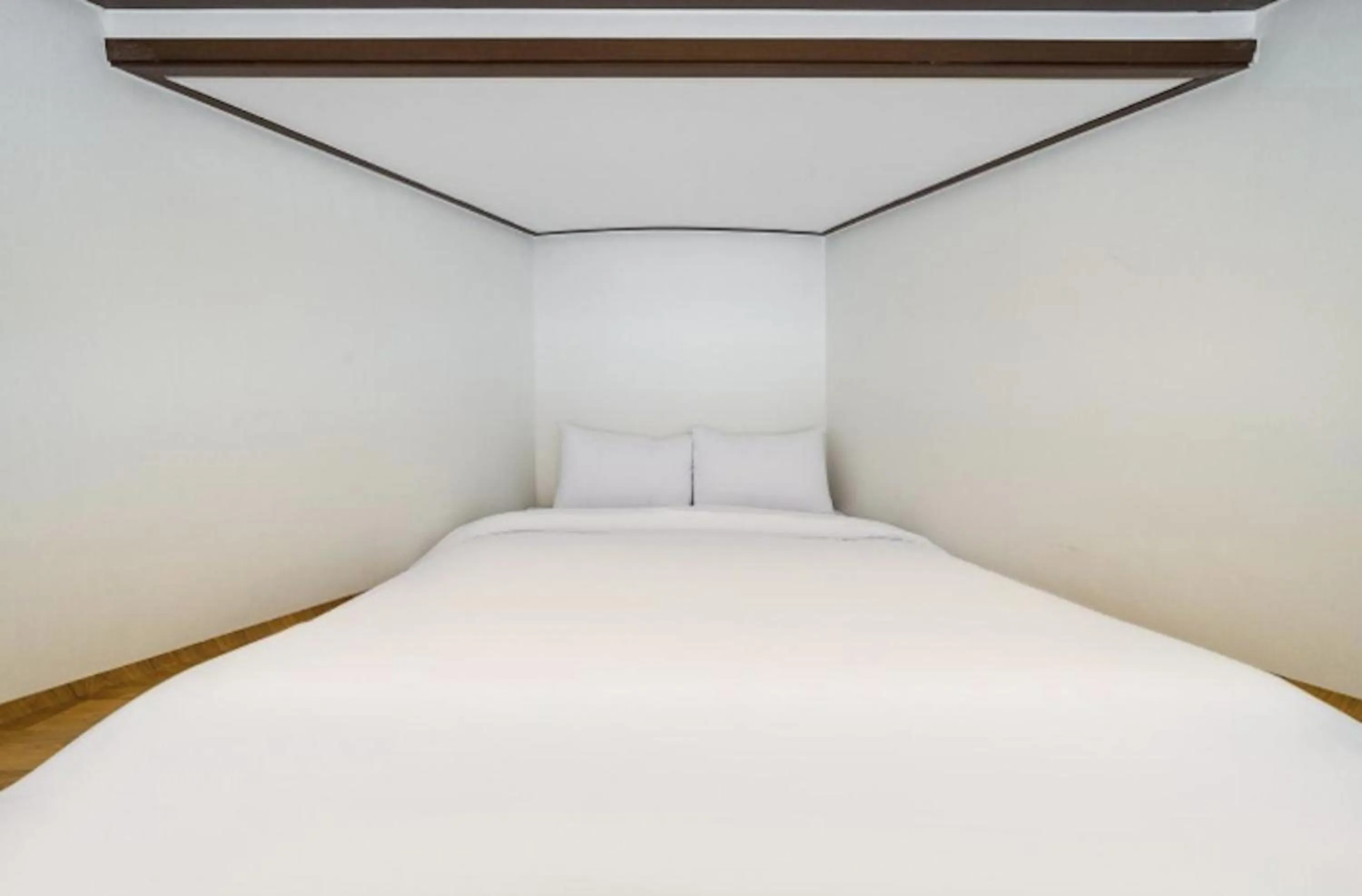 Bed in Jeju Pure Stay Ocean