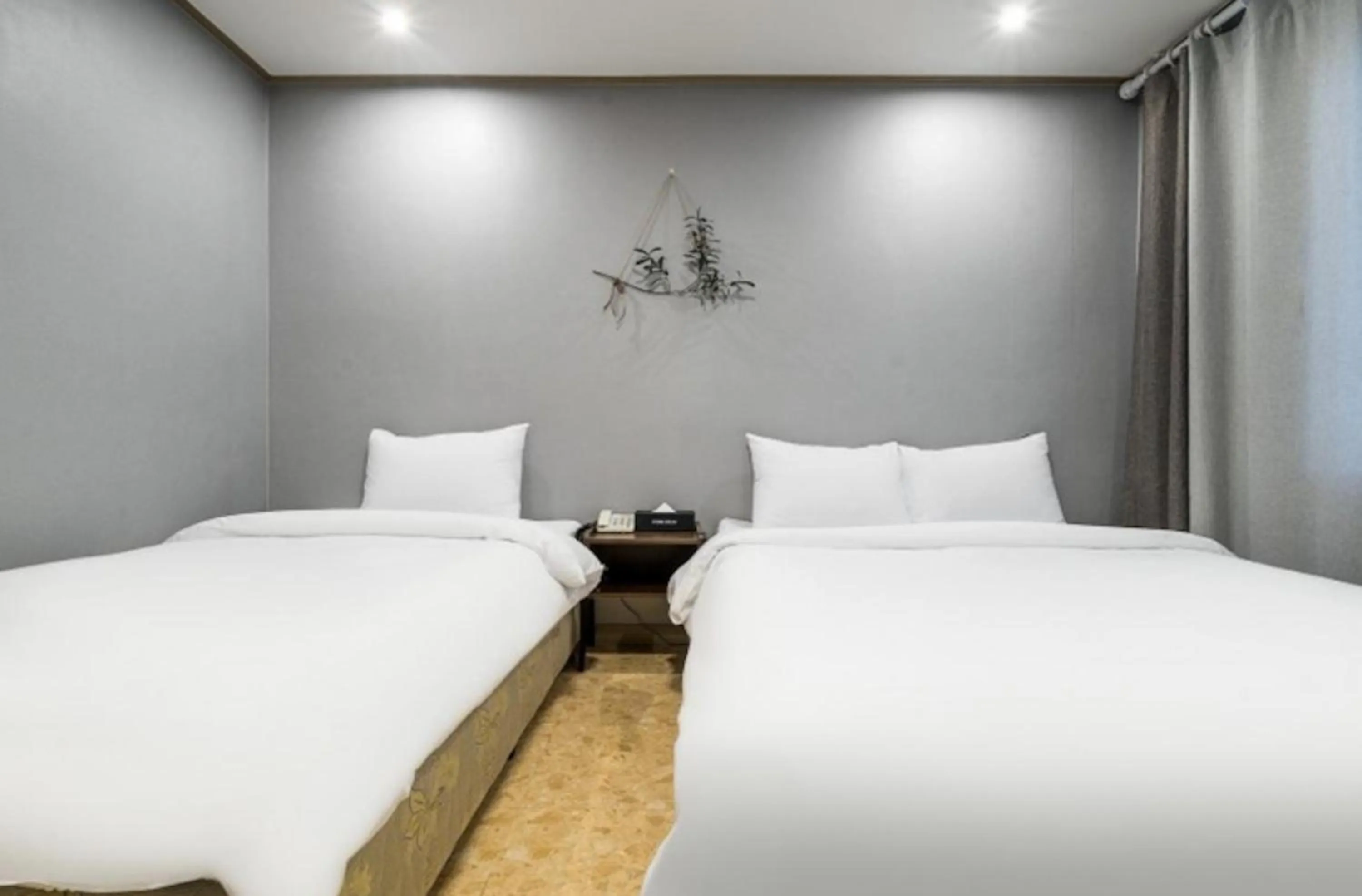 Bed in Jeju Pure Stay Ocean