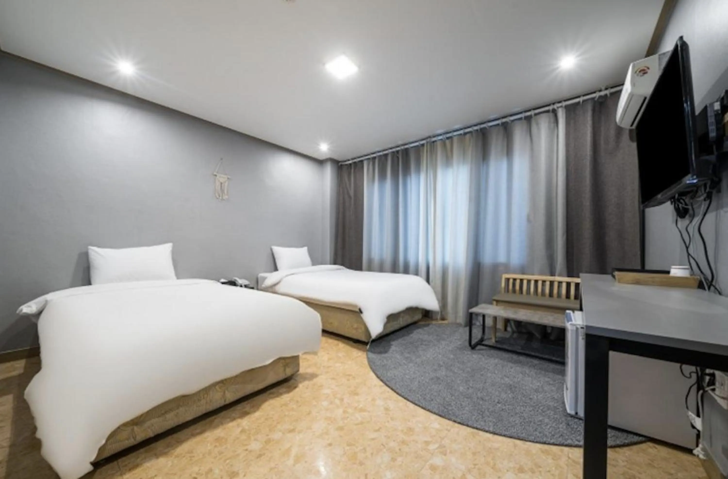 Bed in Jeju Pure Stay Ocean