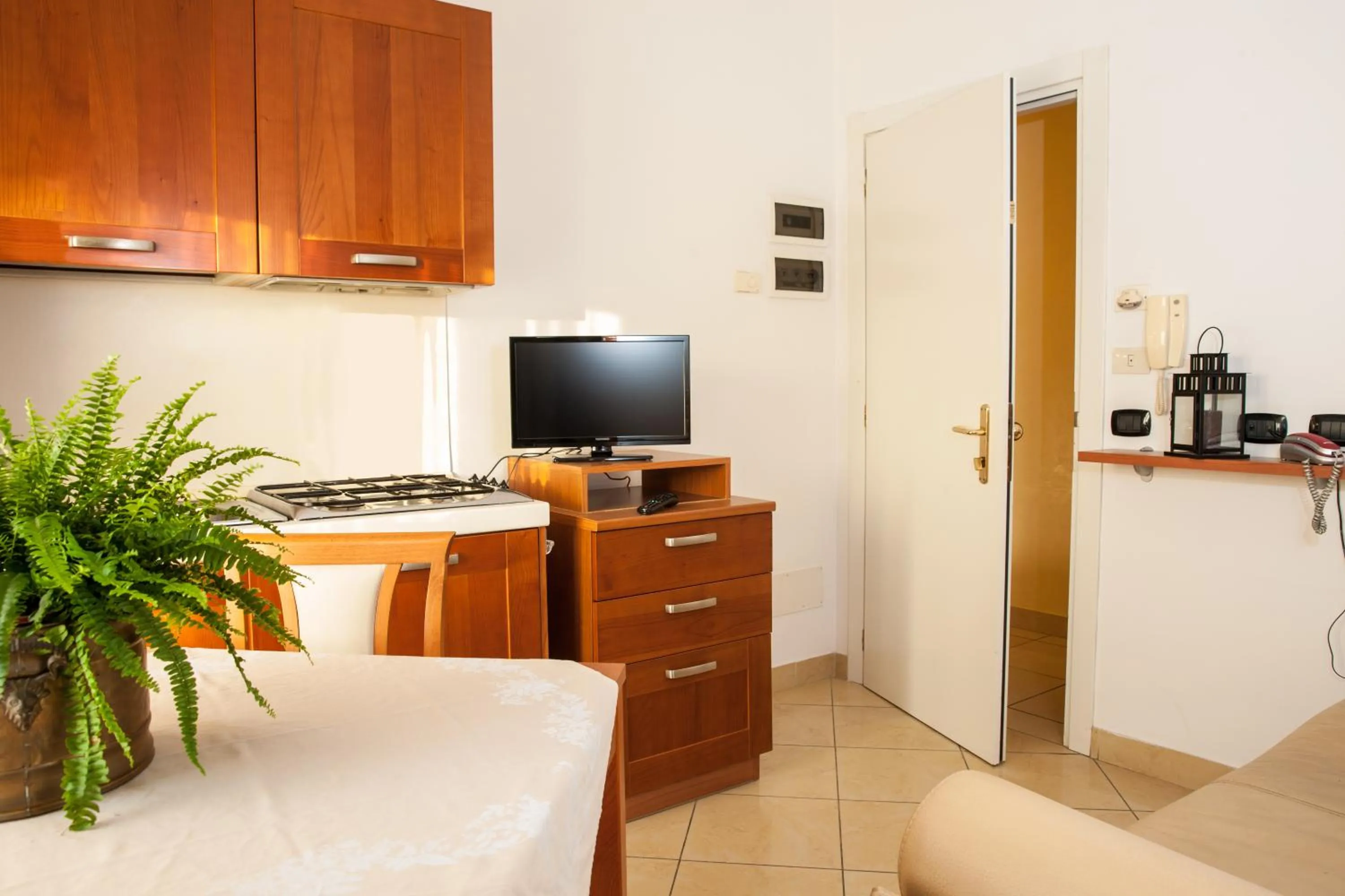 Kitchen or kitchenette in Residence Fellini