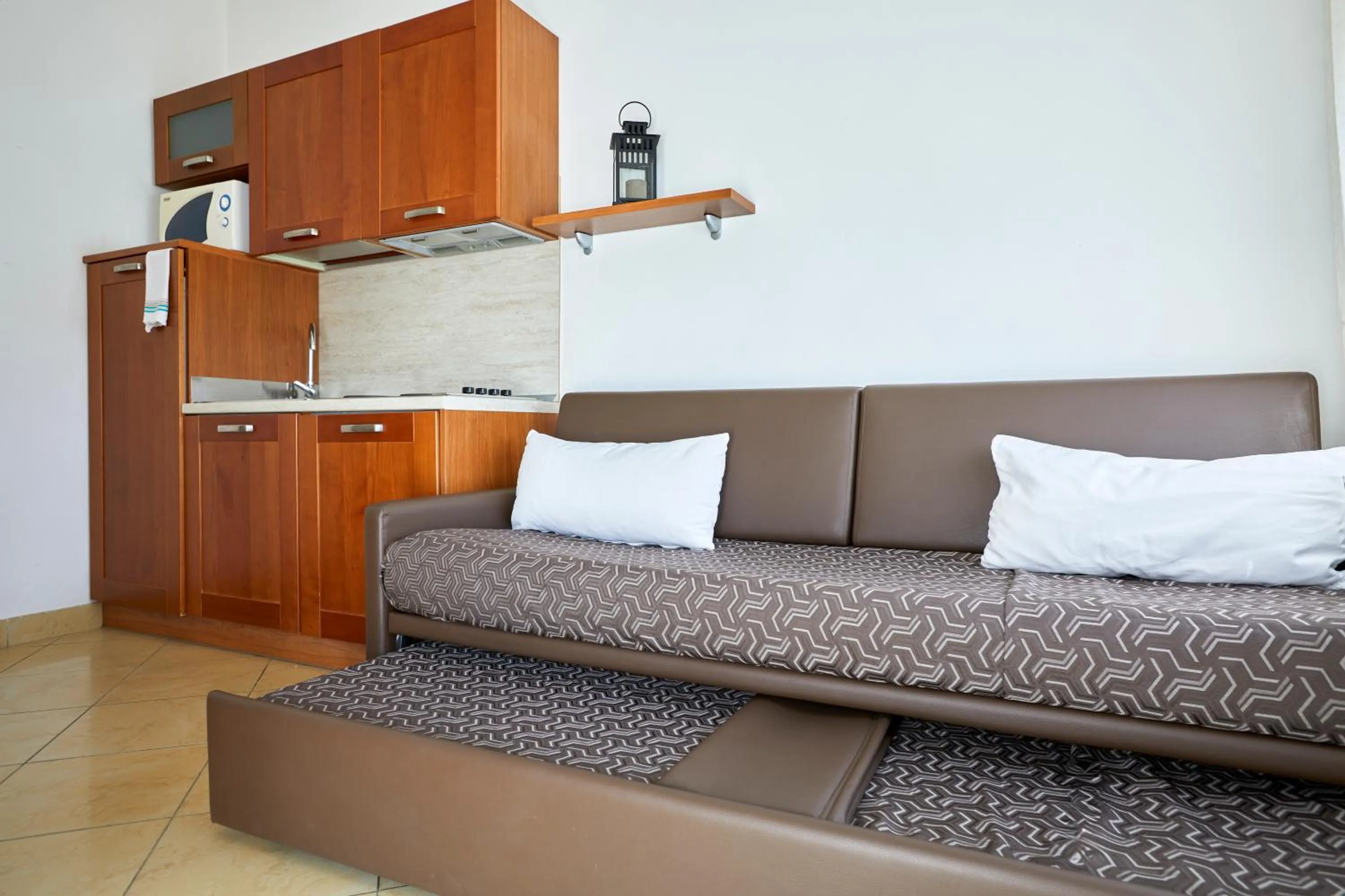 Kitchen or kitchenette in Residence Fellini