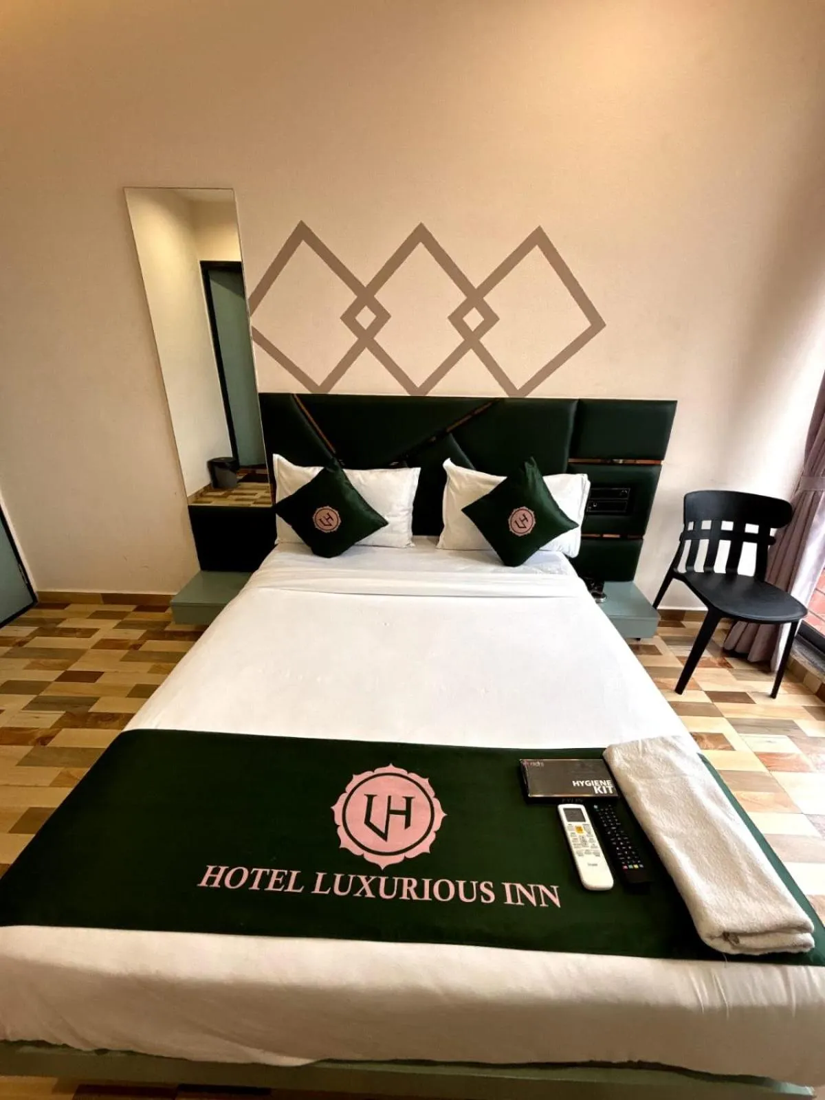 Bed in Hotel Luxurious Inn