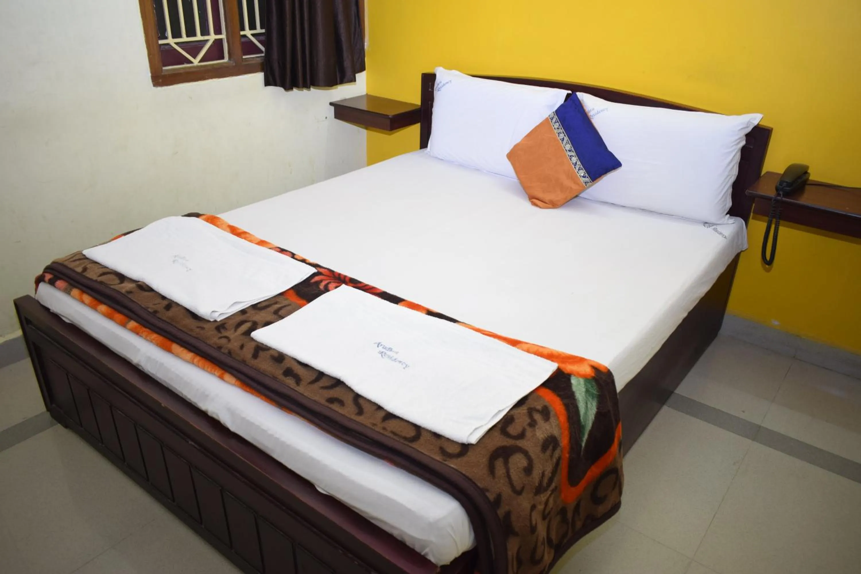 Bed in Arudhra Residency