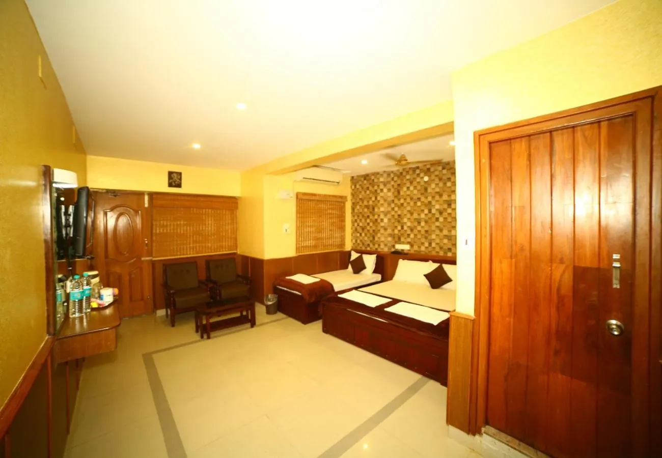 Photo of the whole room, Bed in Arudhra Residency