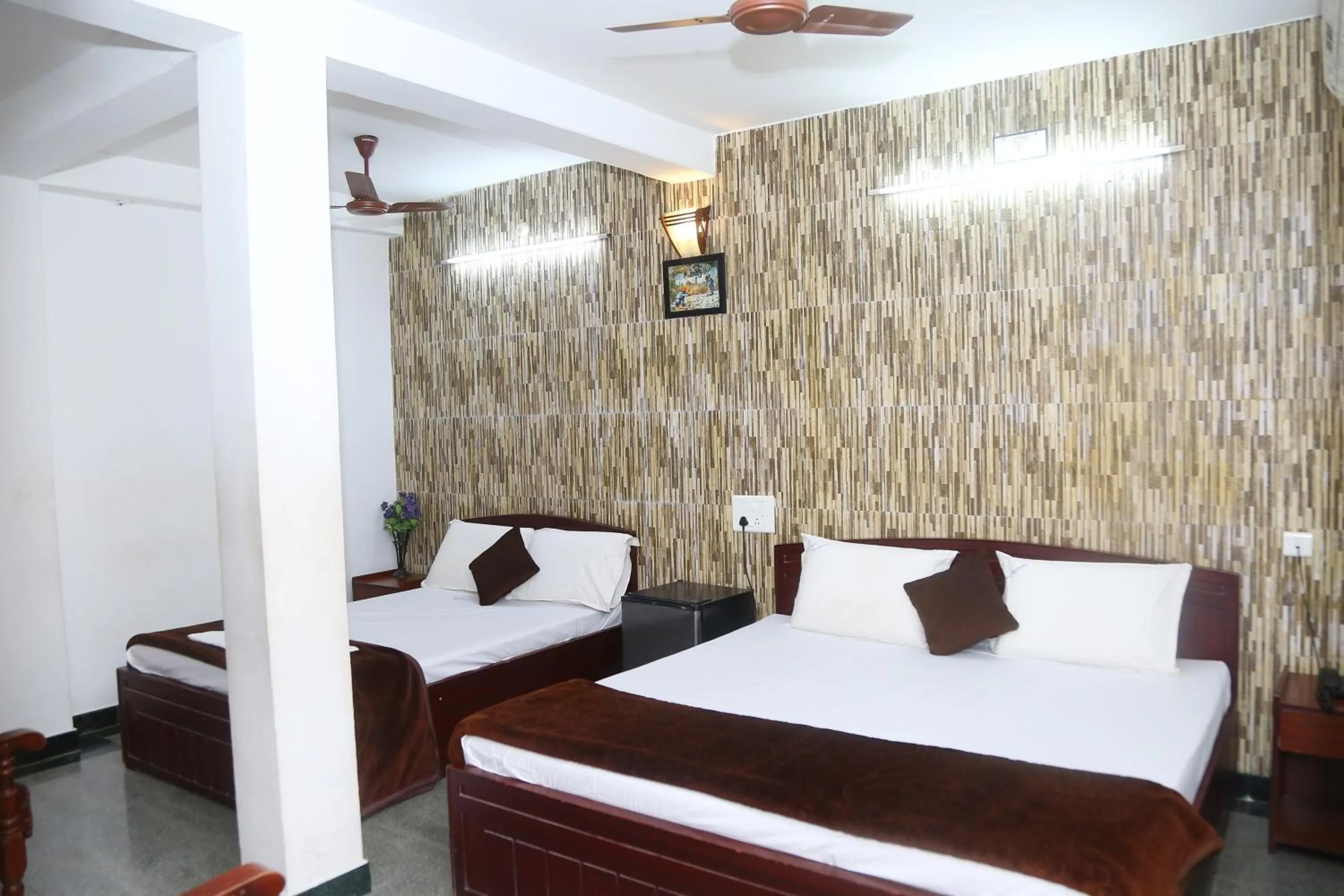 Photo of the whole room, Bed in Arudhra Residency