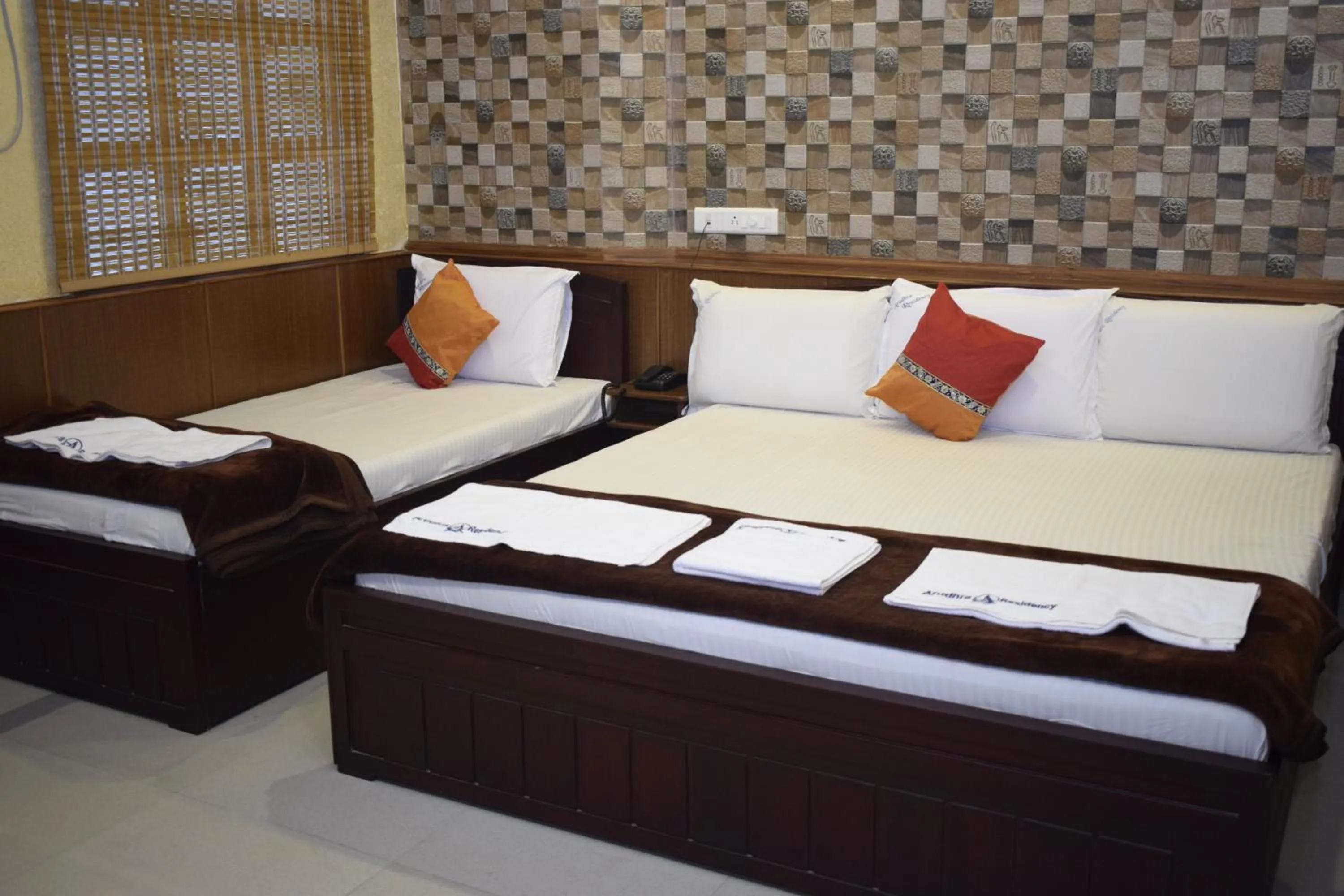 Bed in Arudhra Residency