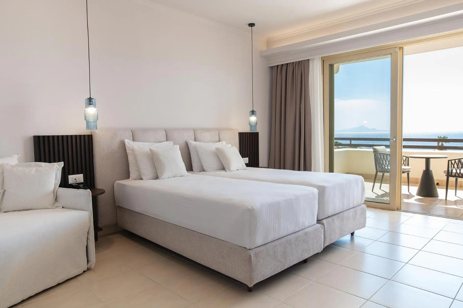 Bed in Grand Blue Beach Hotel