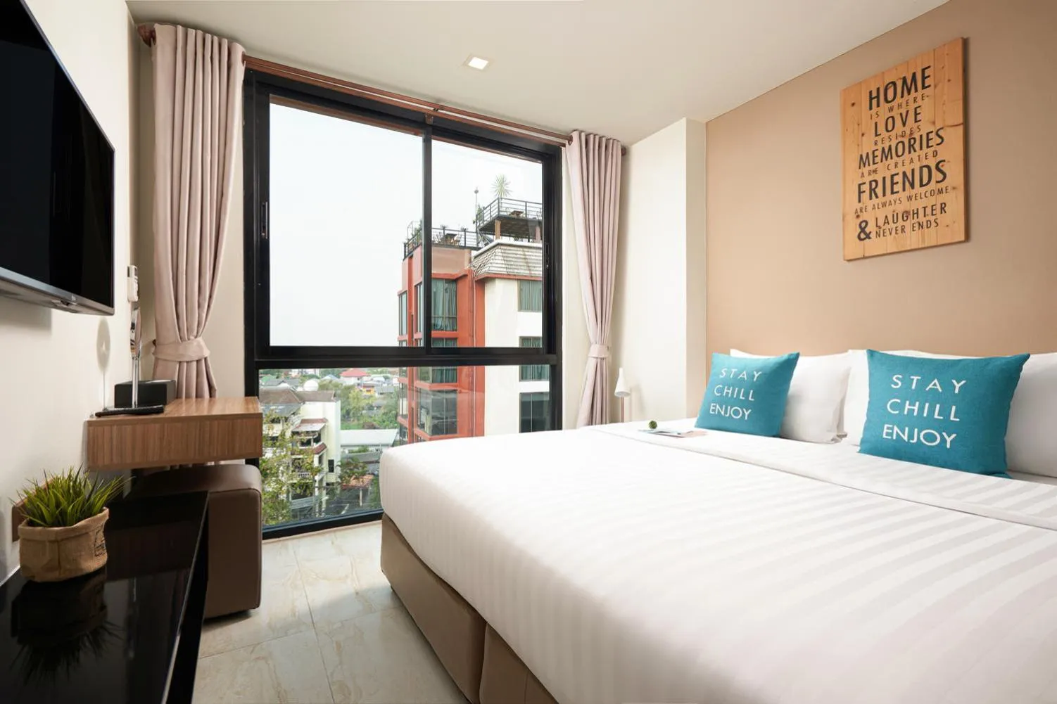 Bed in Cross Vibe Chiang Mai Decem Nimman Hotel