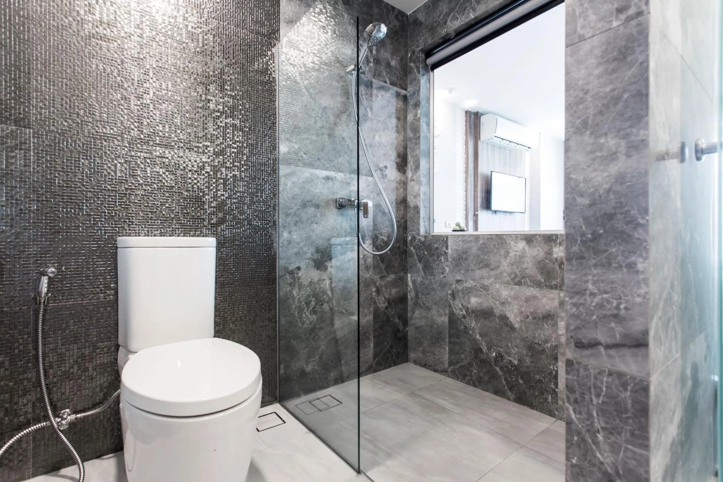 Bathroom in Cross Vibe Chiang Mai Decem Nimman Hotel