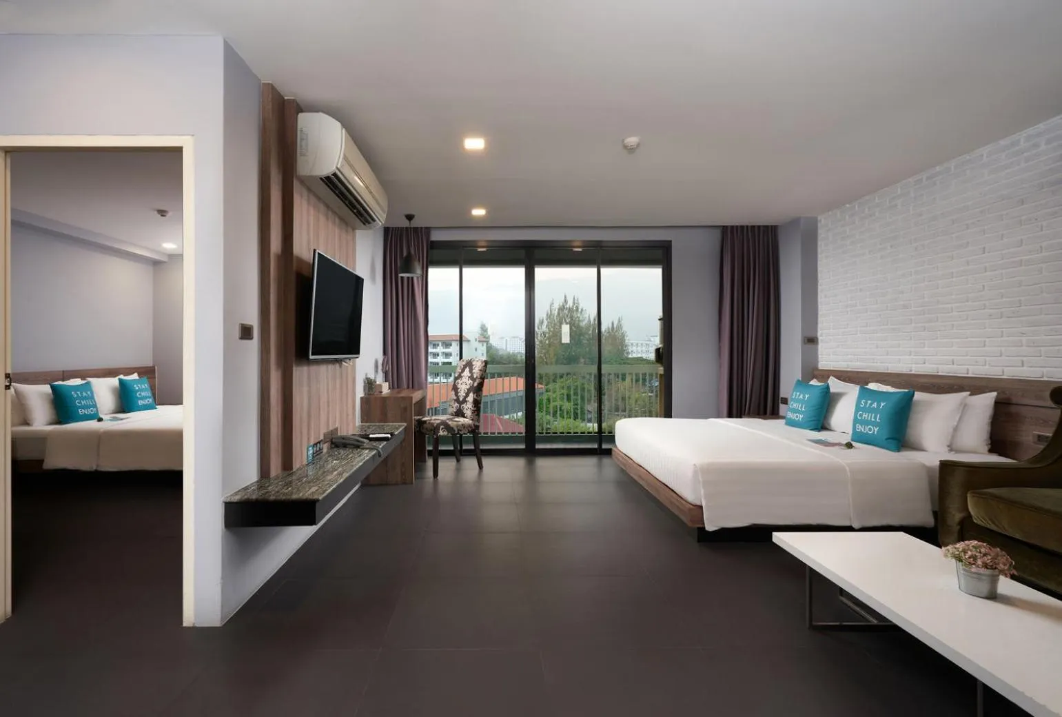 Living room, Bed in Cross Vibe Chiang Mai Decem Nimman Hotel