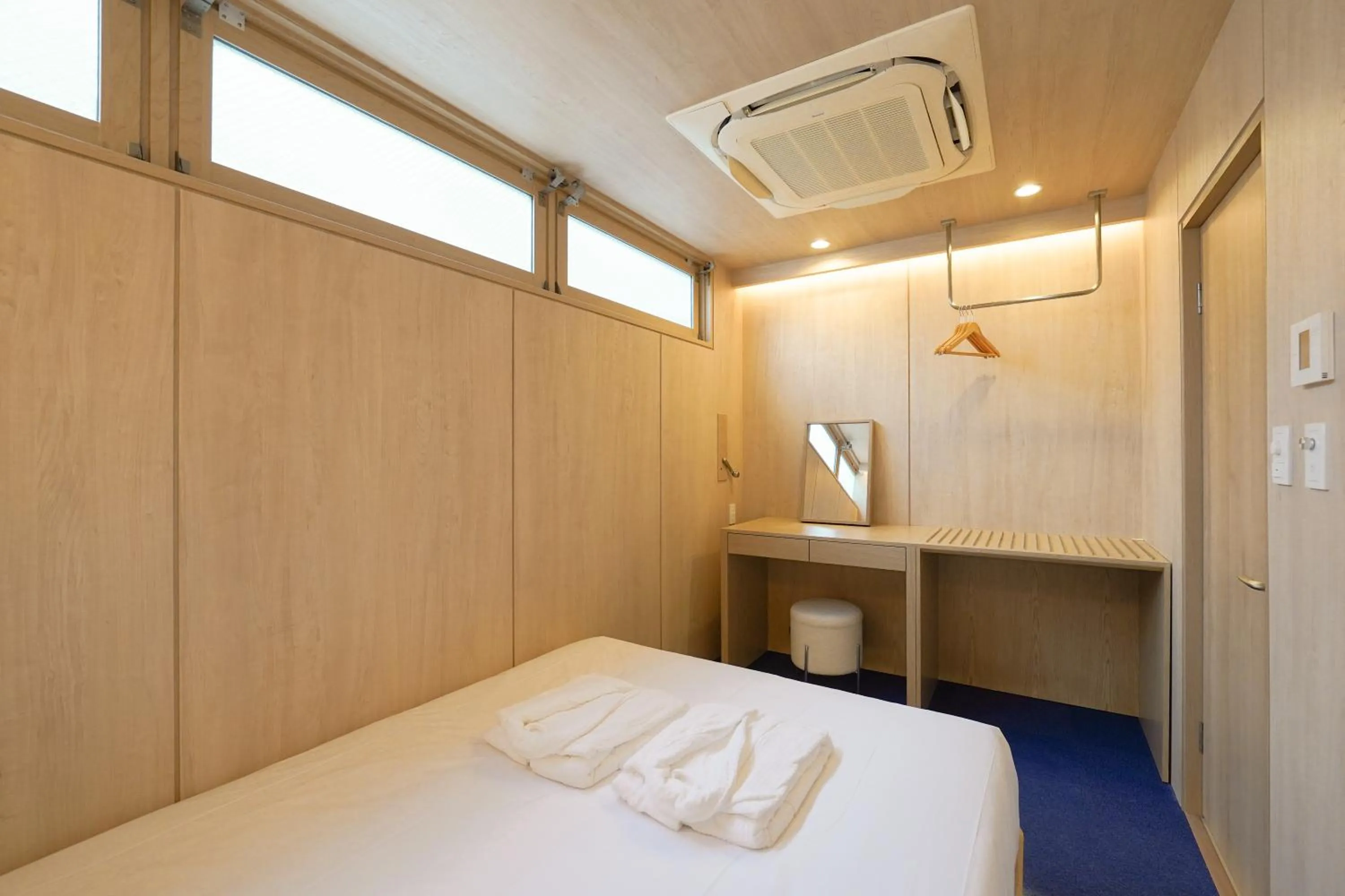 Decorative detail, Bed in UH Suite Namba Station The Spa