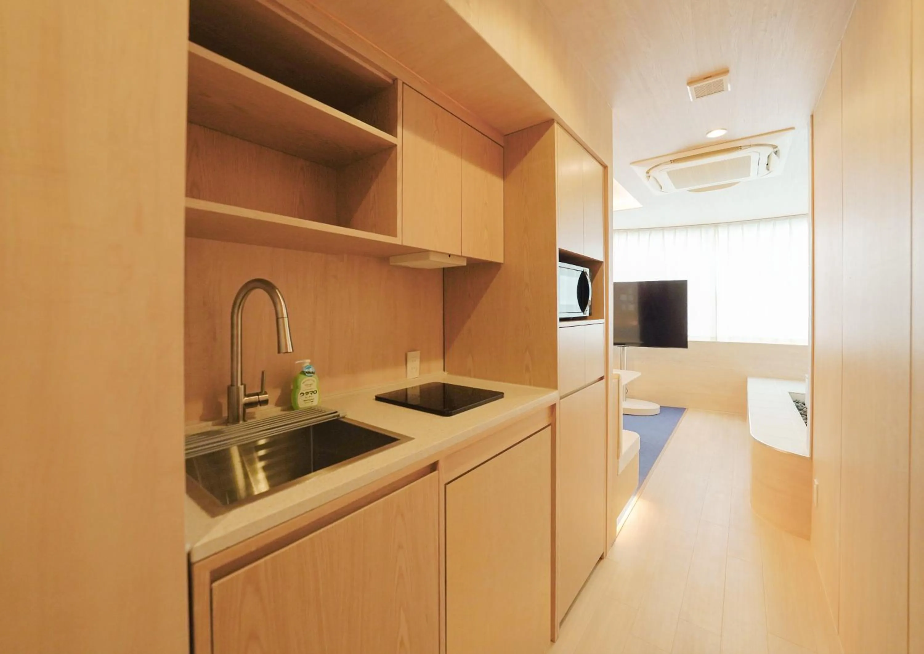kitchen in UH Suite Namba Station The Spa
