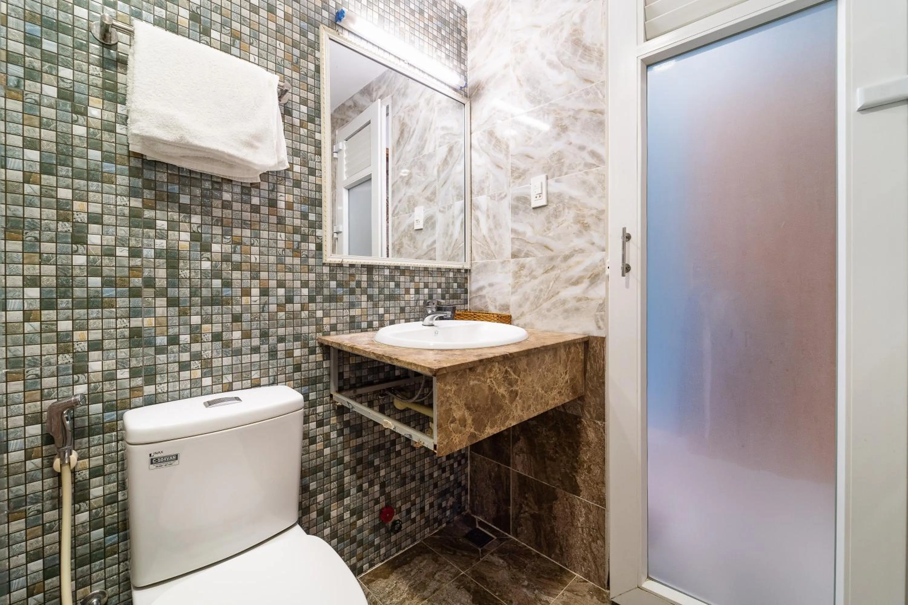 Bathroom in Collection O Sunrise Hotel Trung Son Near Lotte Mart