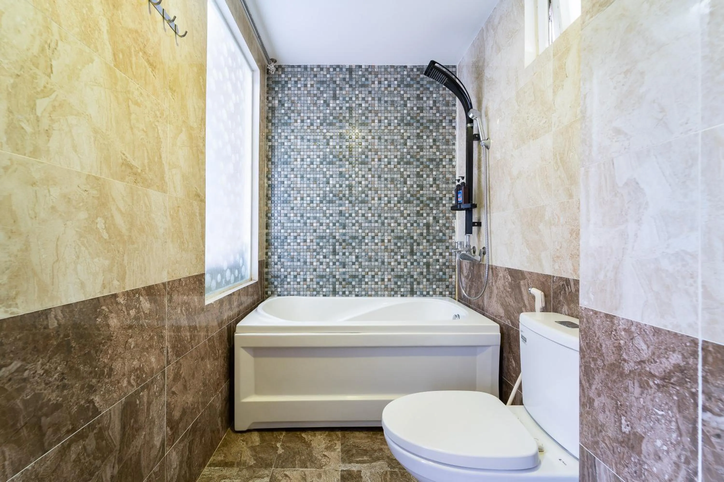 Bathroom in Collection O Sunrise Hotel Trung Son Near Lotte Mart