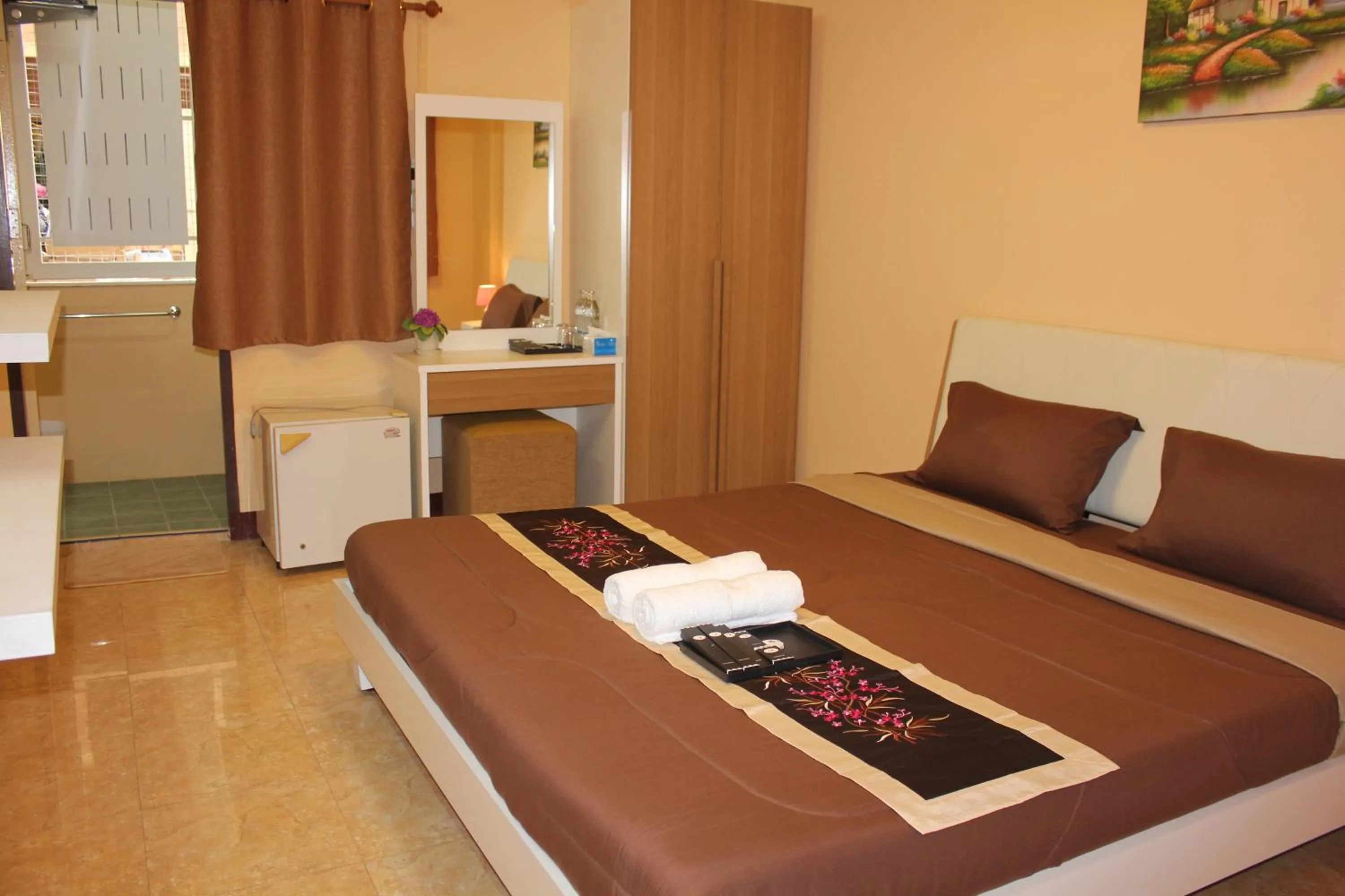 Bed in Navavilla Serviced Apartment