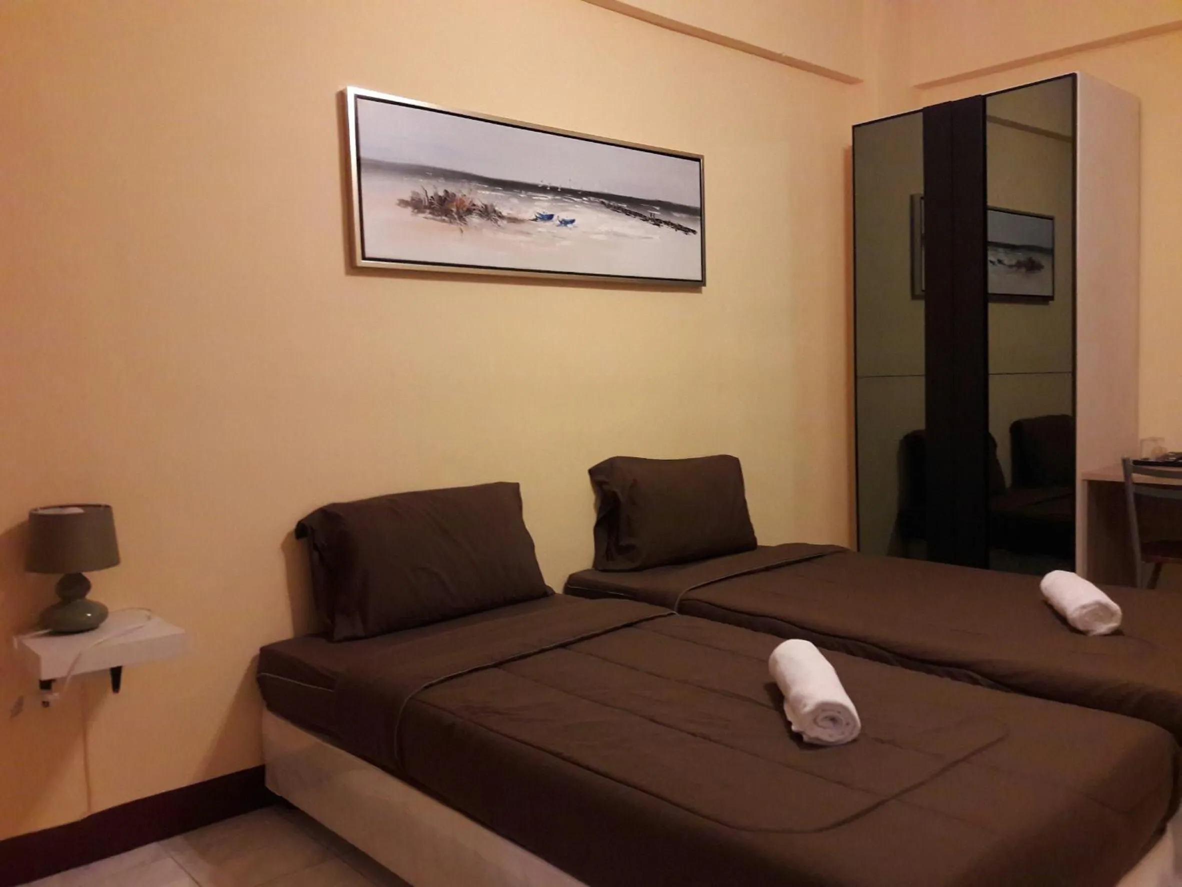 Bed in Navavilla Serviced Apartment