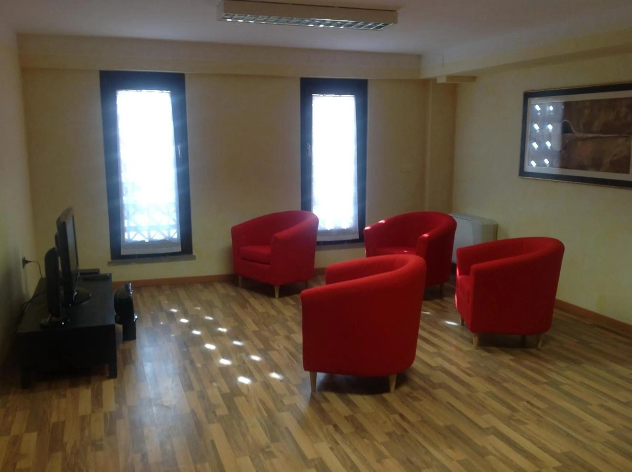 Communal lounge/ TV room in B&B dell'Aviatore