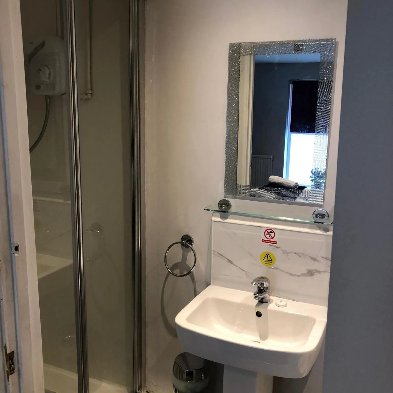 Bathroom in OYO Watton Vibe Hotel