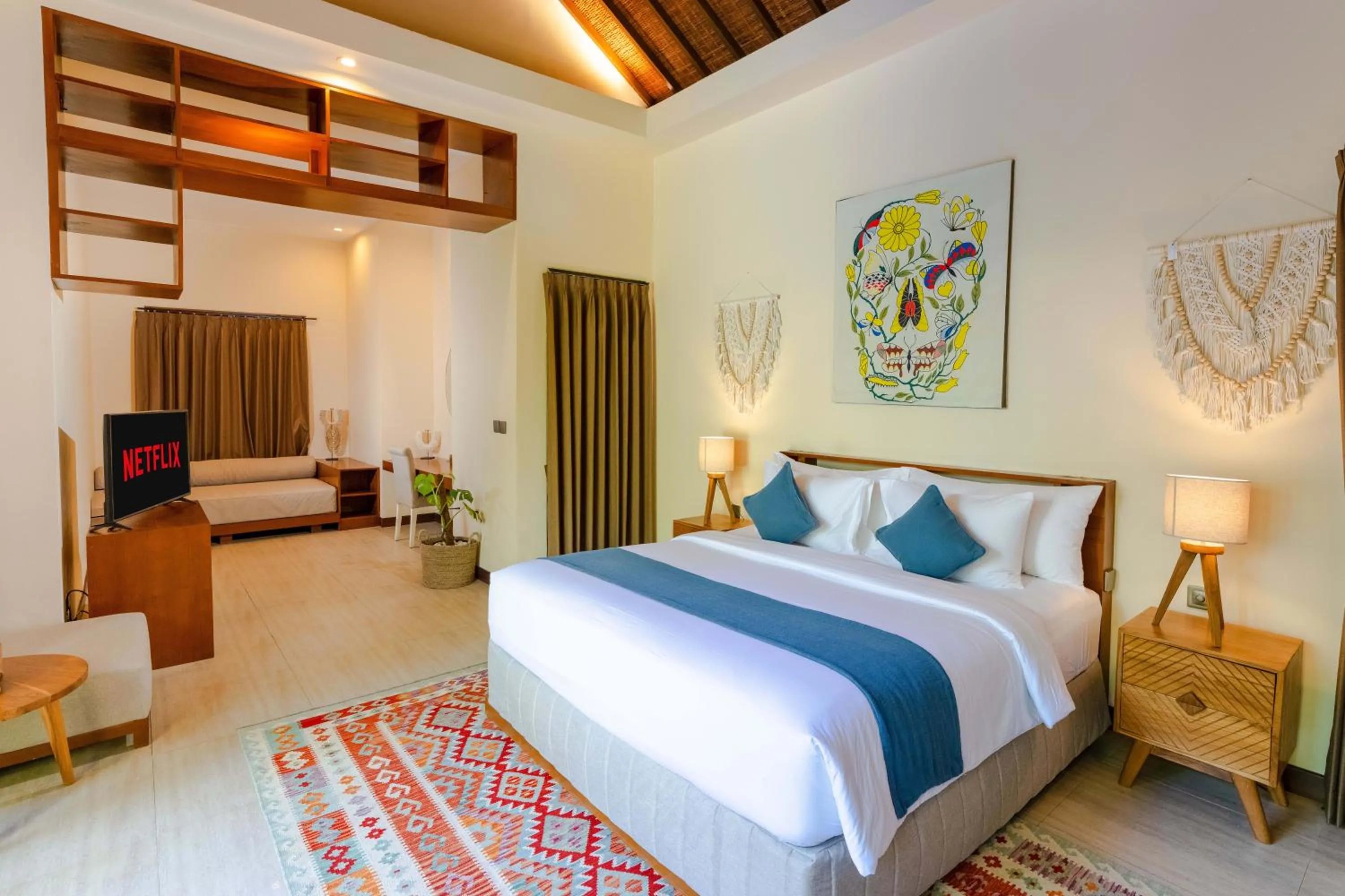 Bed in Boholuma Villas by Pertama Management