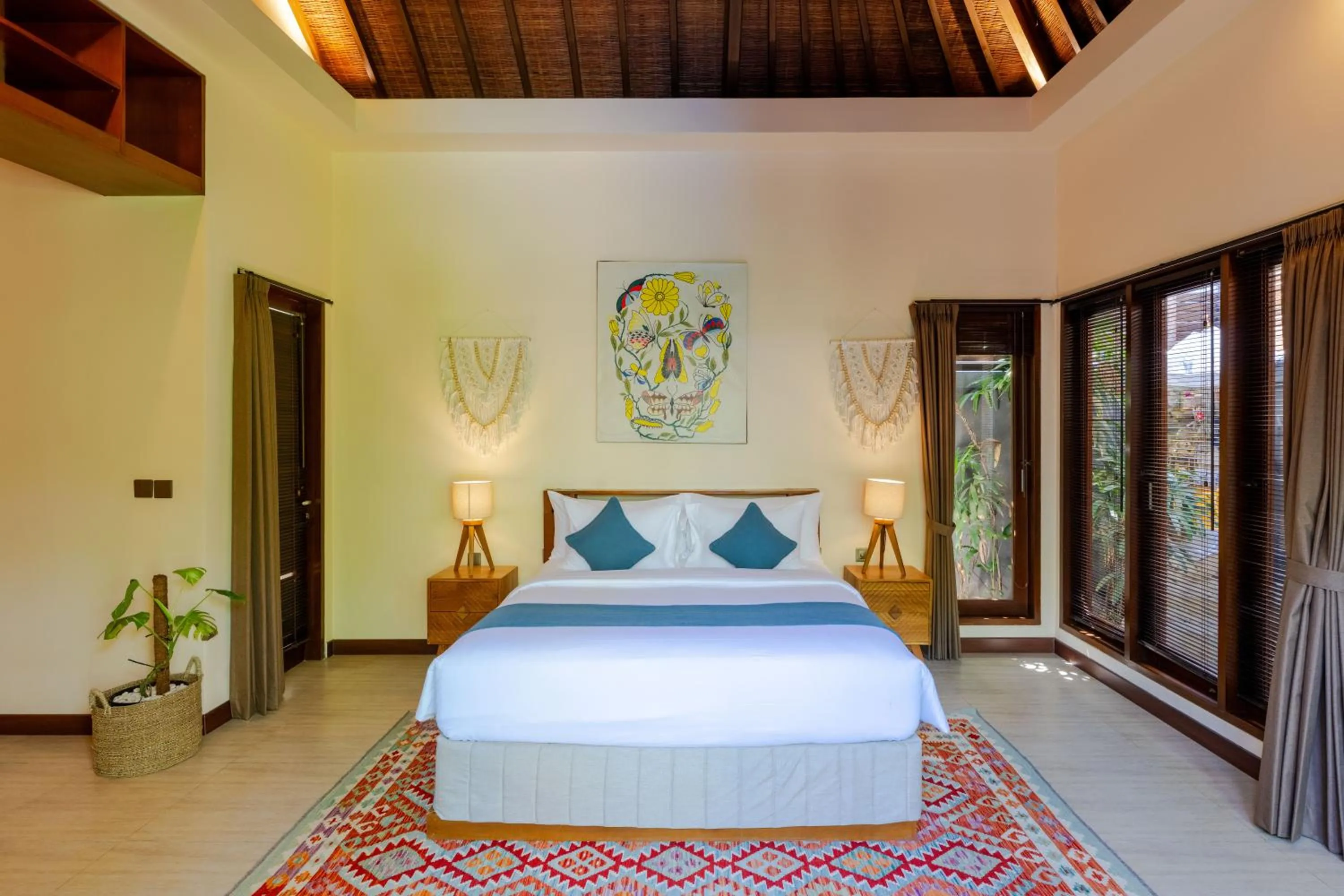 Bed in Boholuma Villas by Pertama Management