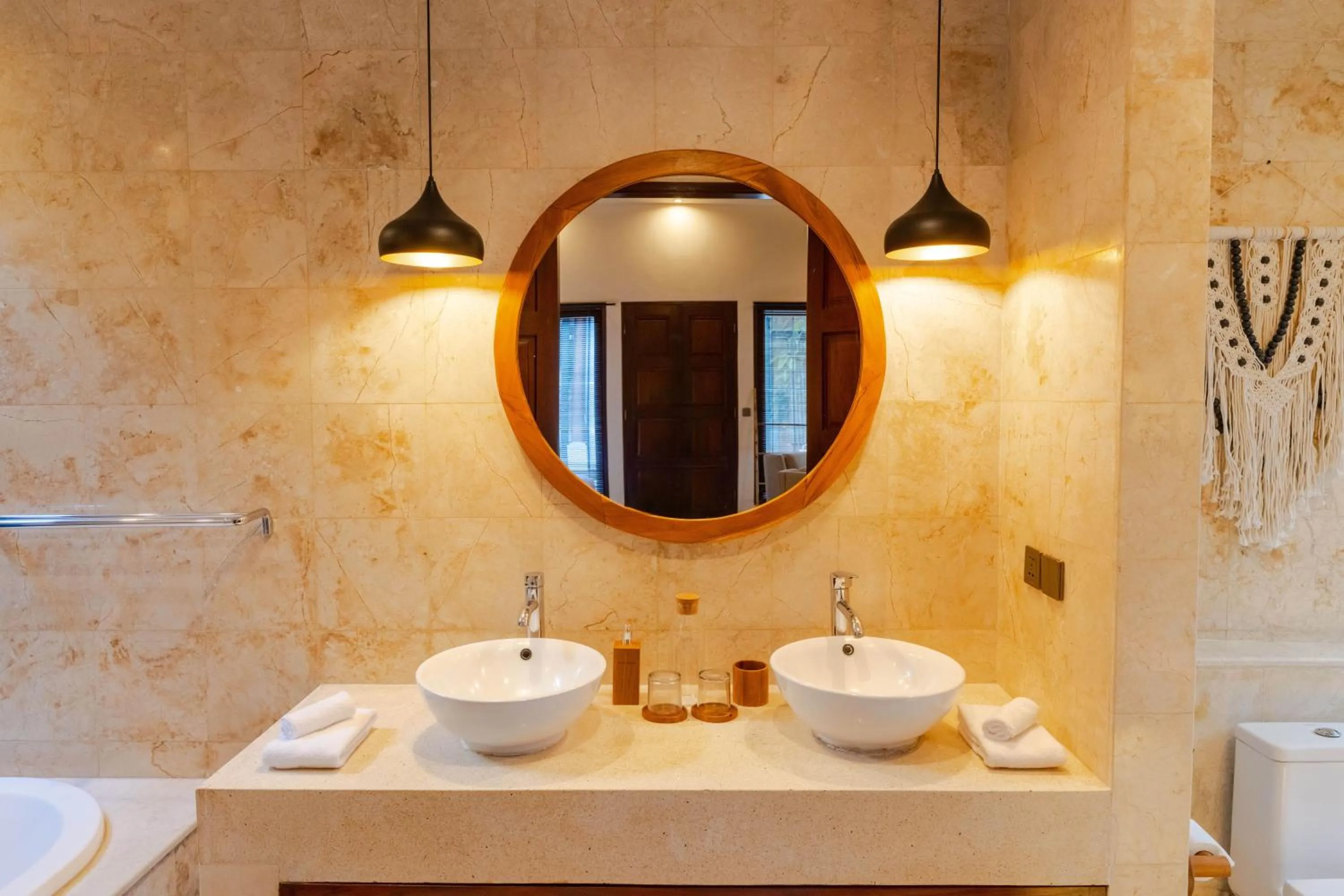 Bathroom in Boholuma Villas by Pertama Management