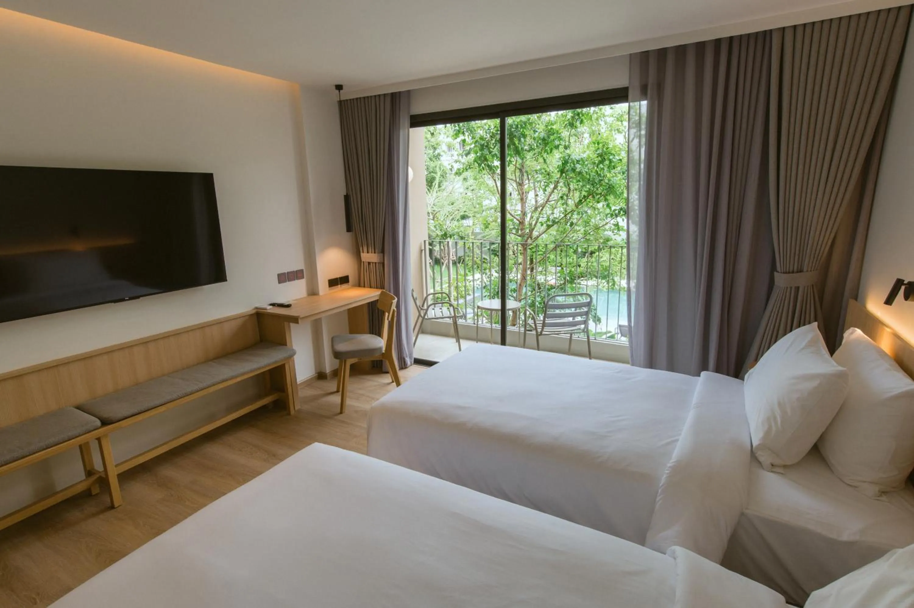 Bed in PAAK Hotel Suvarnabhumi