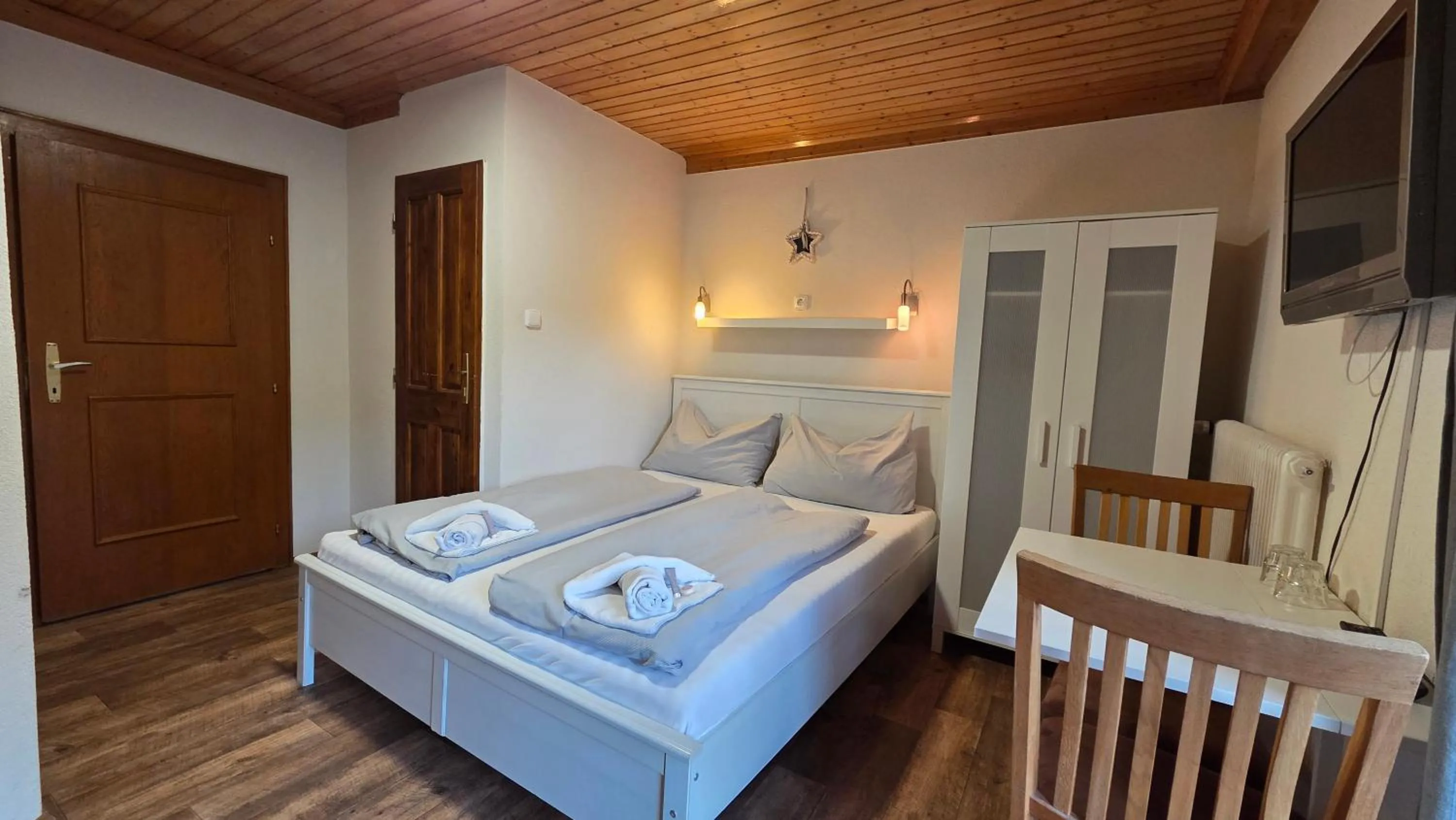 Photo of the whole room, Bed in Pension Tyrol Maria Alm
