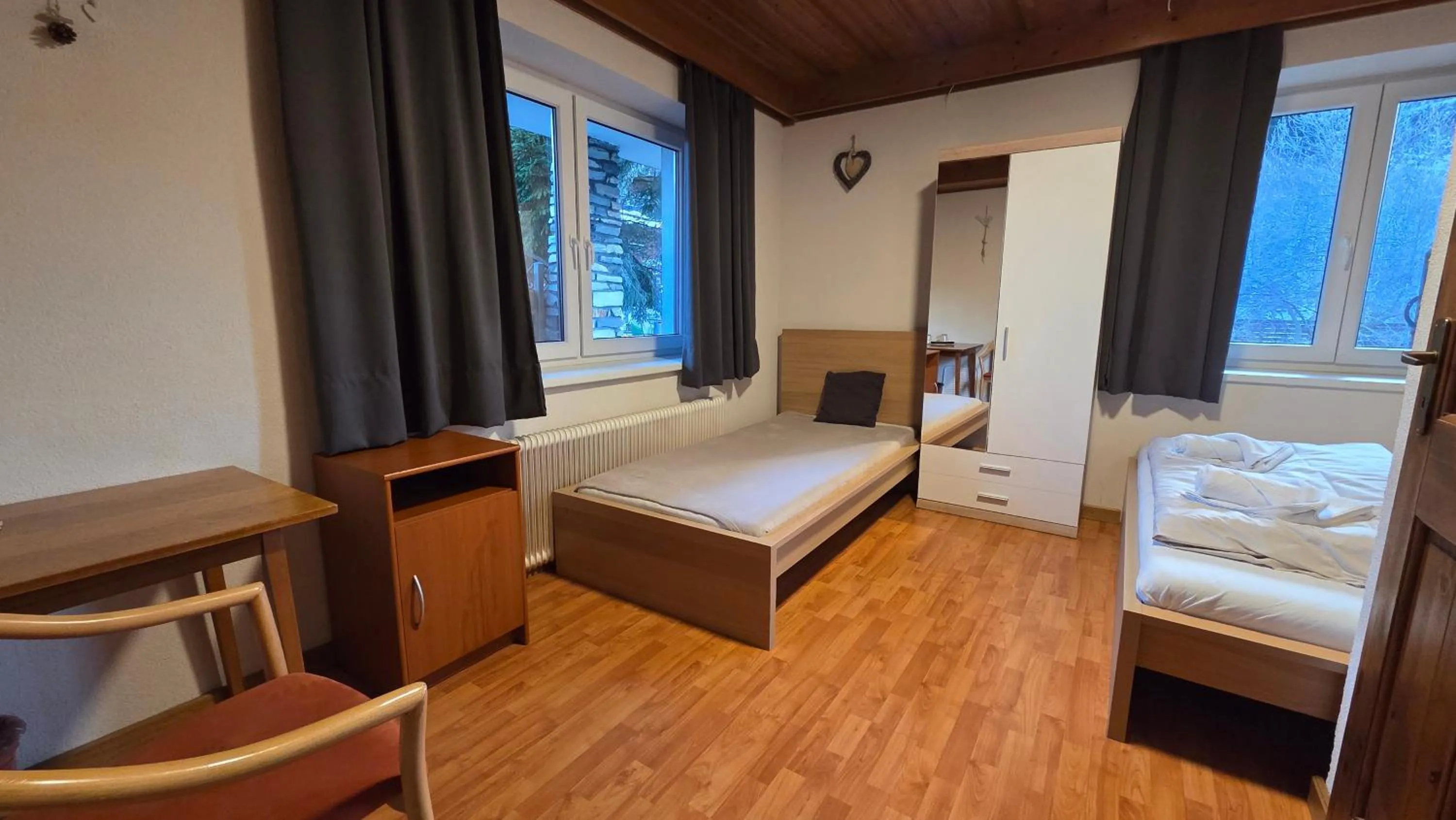 Photo of the whole room, Bed in Pension Tyrol Maria Alm
