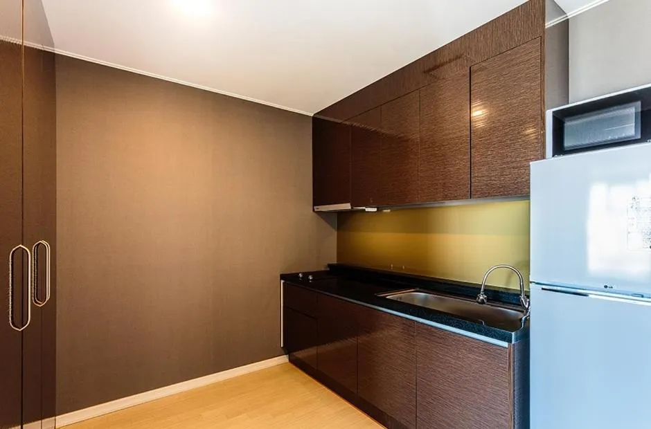 Kitchen or kitchenette in Rich Hotel