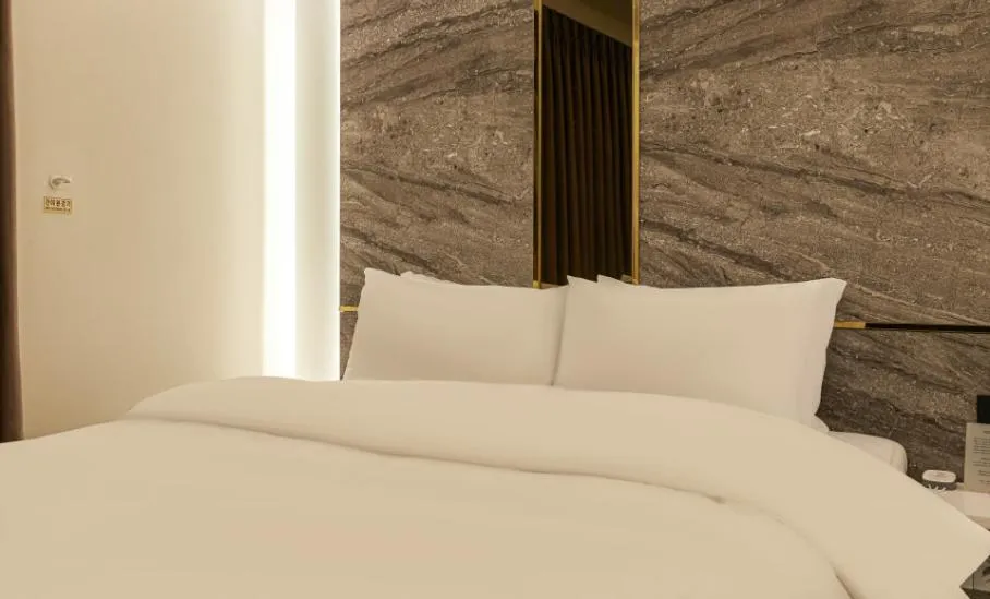 Bed in Hotel 99 Prestige