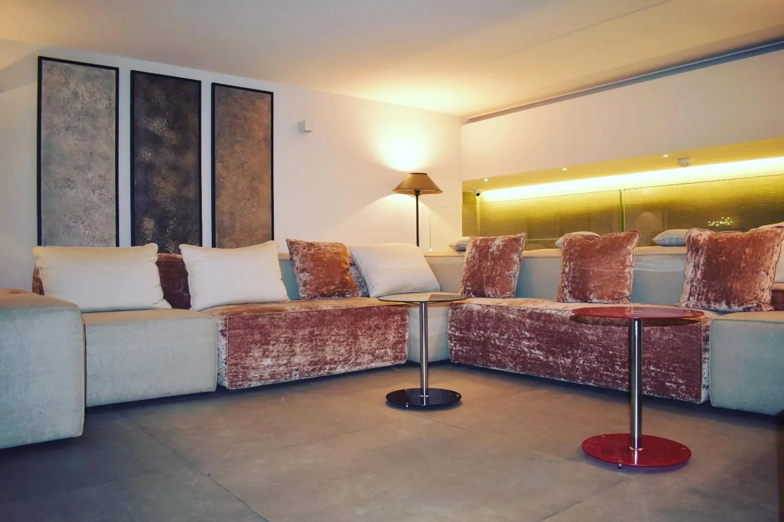 Communal lounge/ TV room in Room 230 Roma Luxury Suites