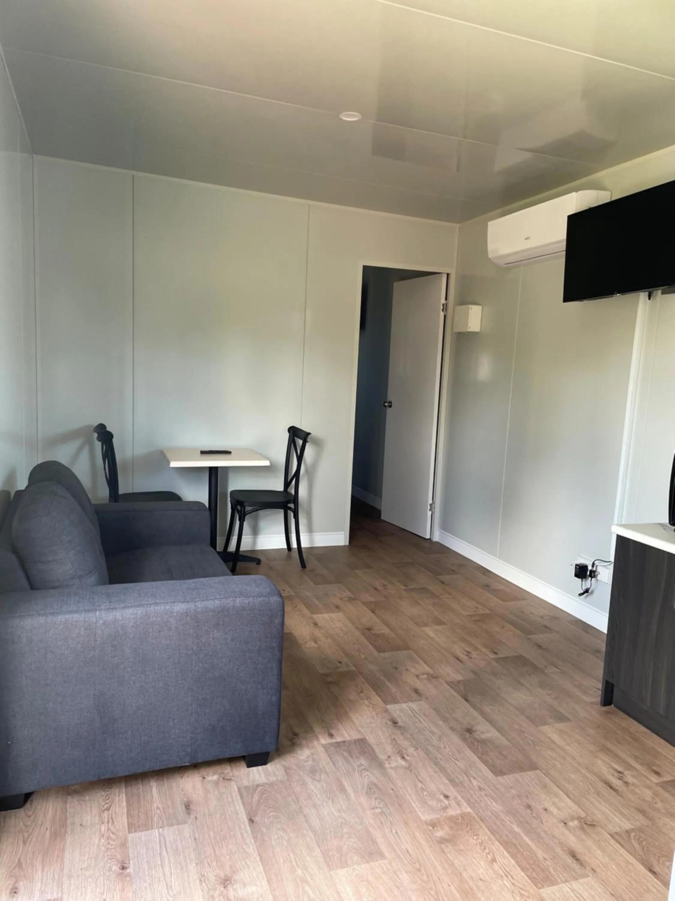 Living room in Australian Motor Home Tourist Park Twelve Mile Creek