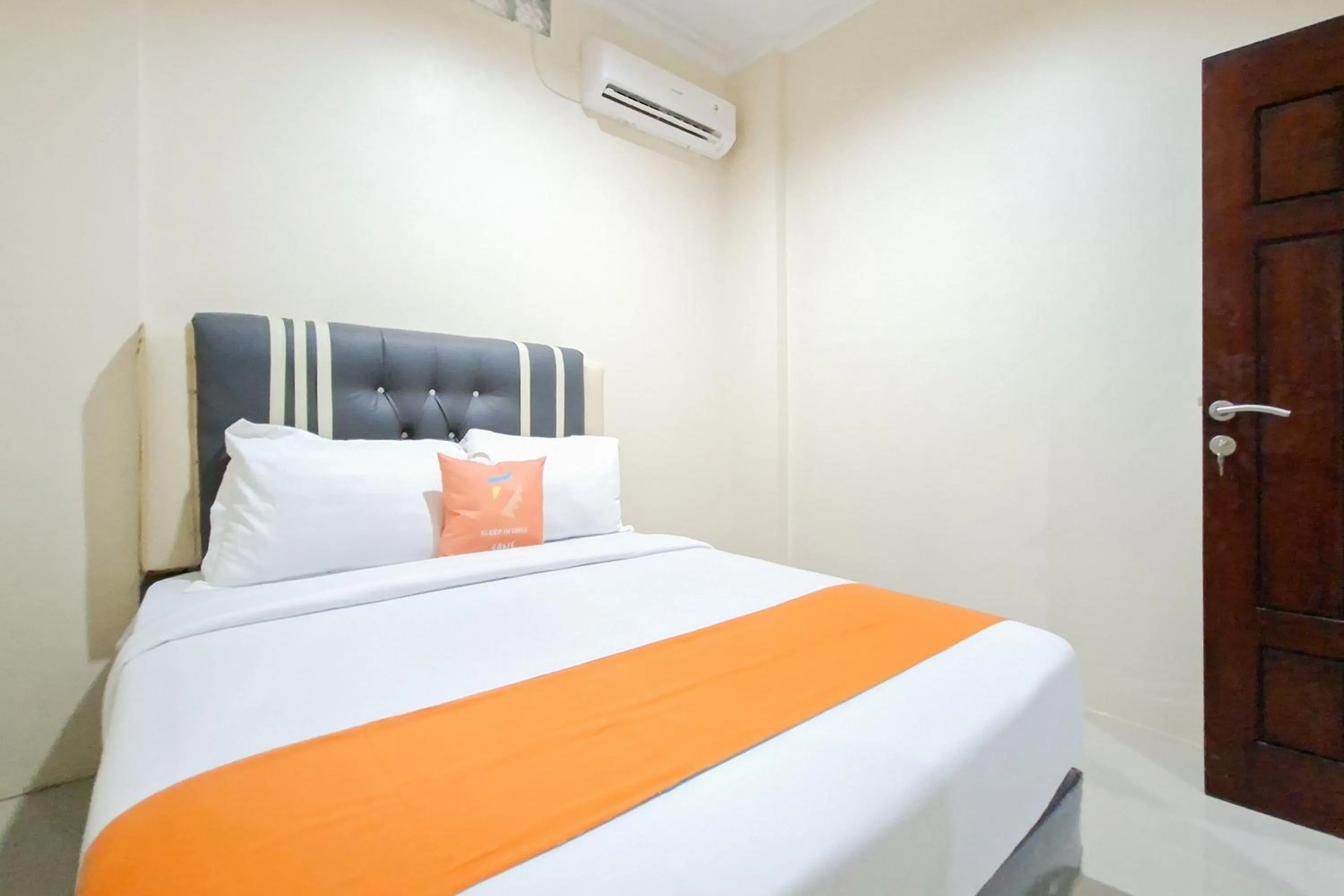 Bedroom in Sans Hotel Bliss Pekanbaru