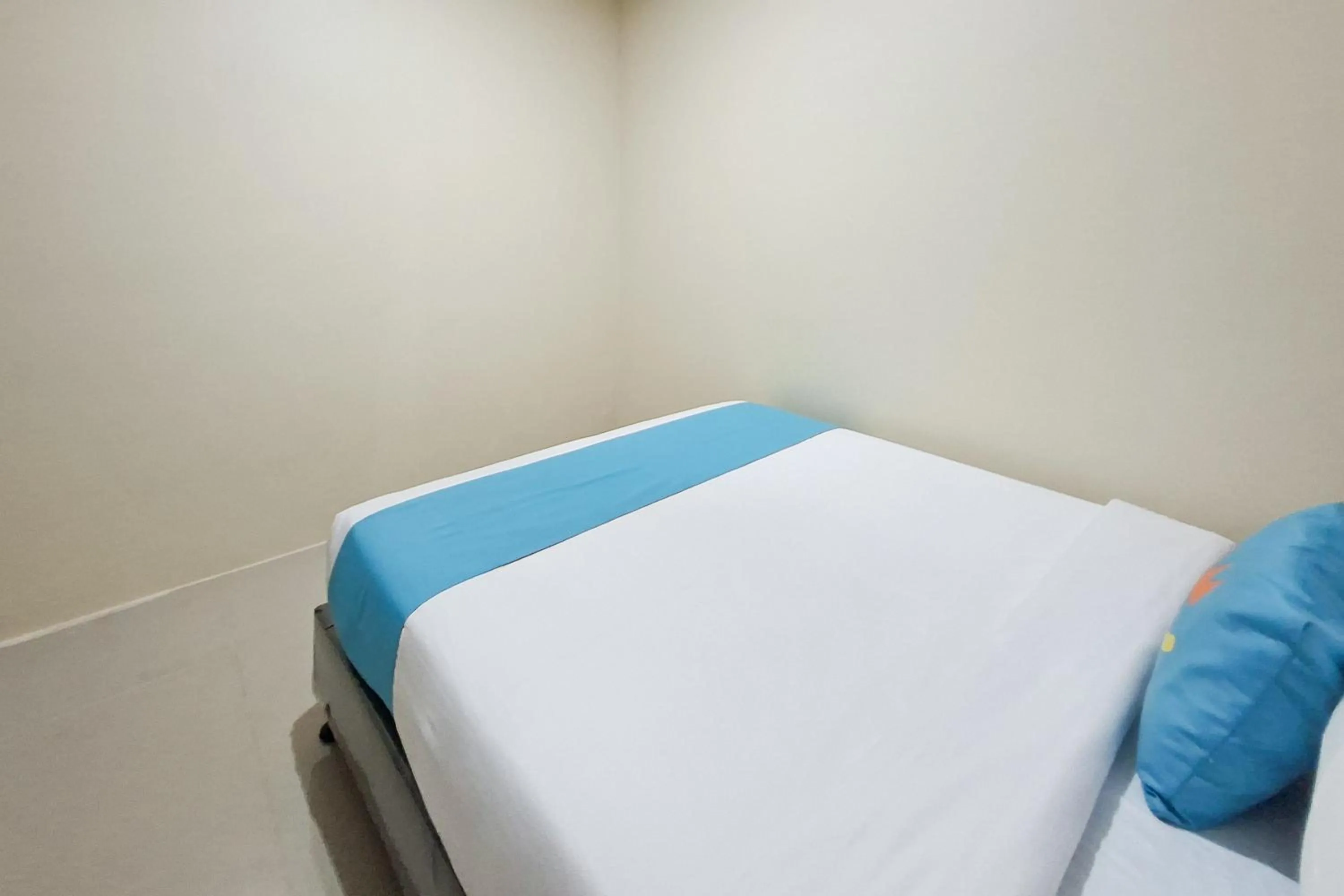 Bedroom in Sans Hotel Bliss Pekanbaru