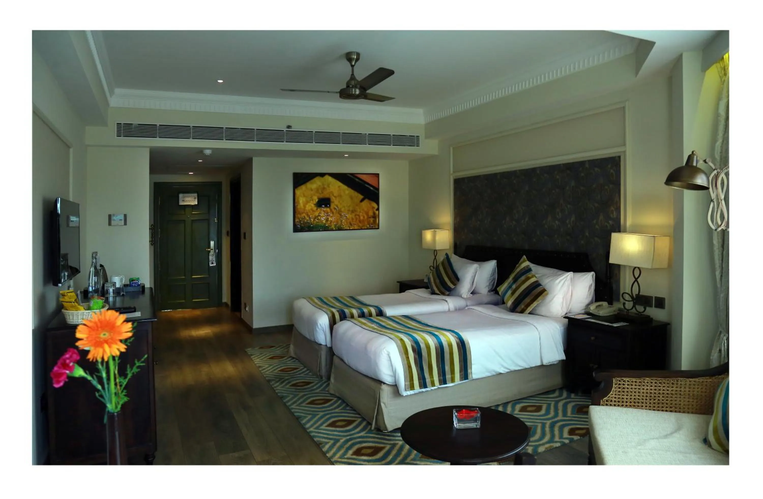 Bed in Fragrant Nature Kochi - A Five star Classified Hotel