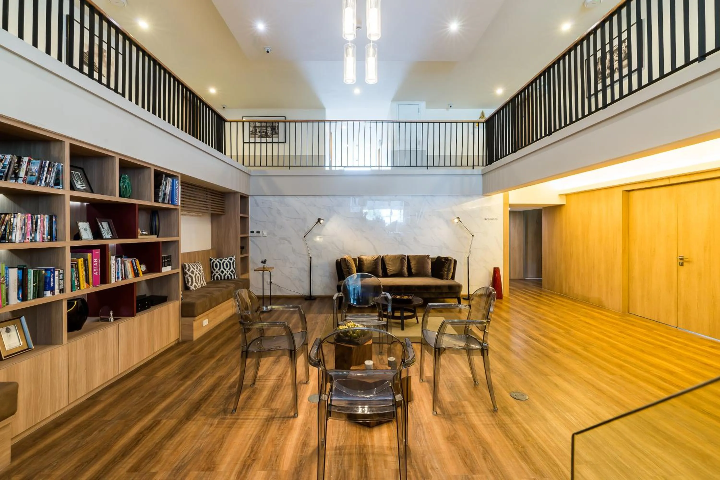 Library in The Residence on Thonglor by UHG