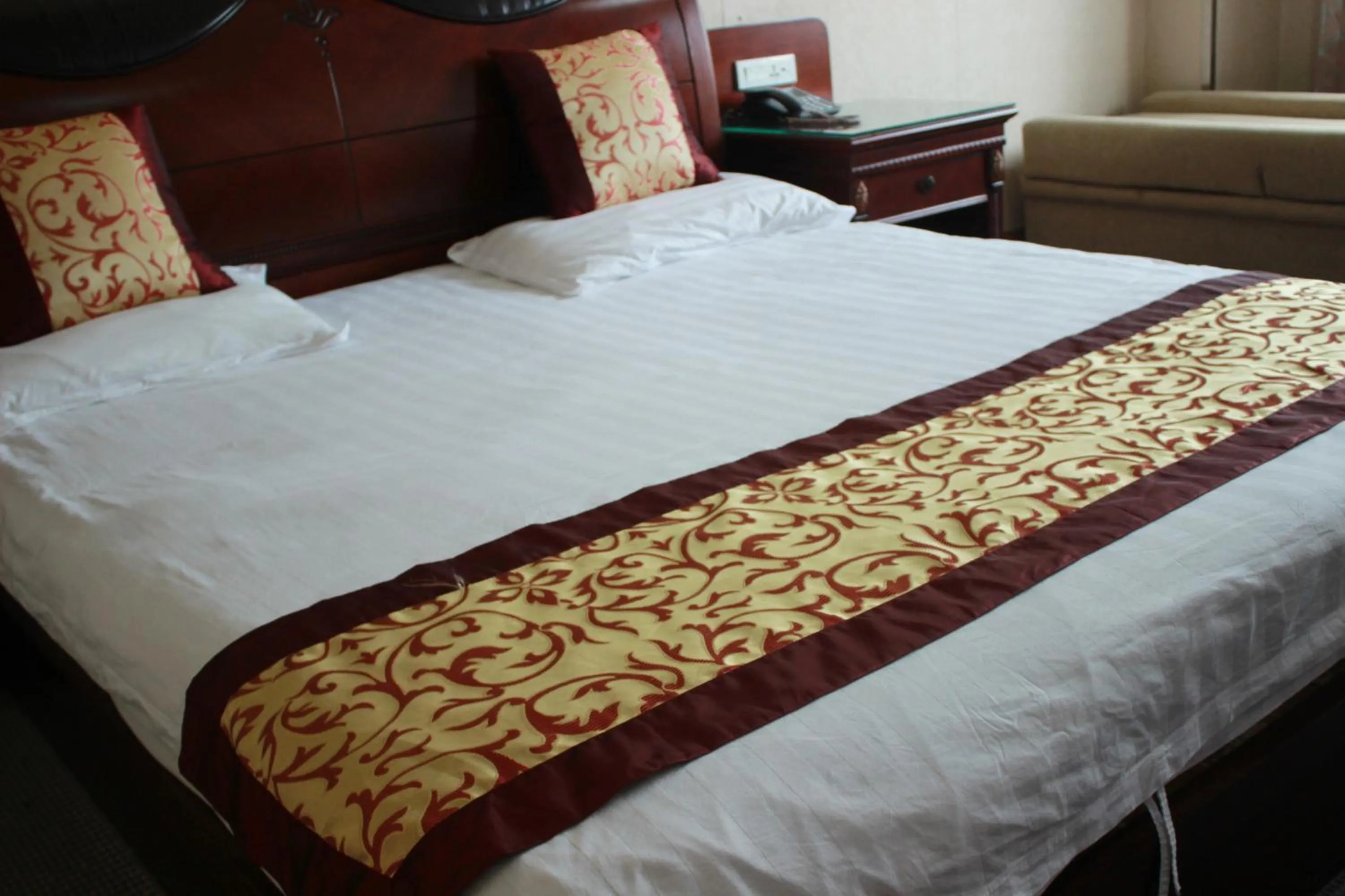 Bed in Taizhou Taishan Business Hotel