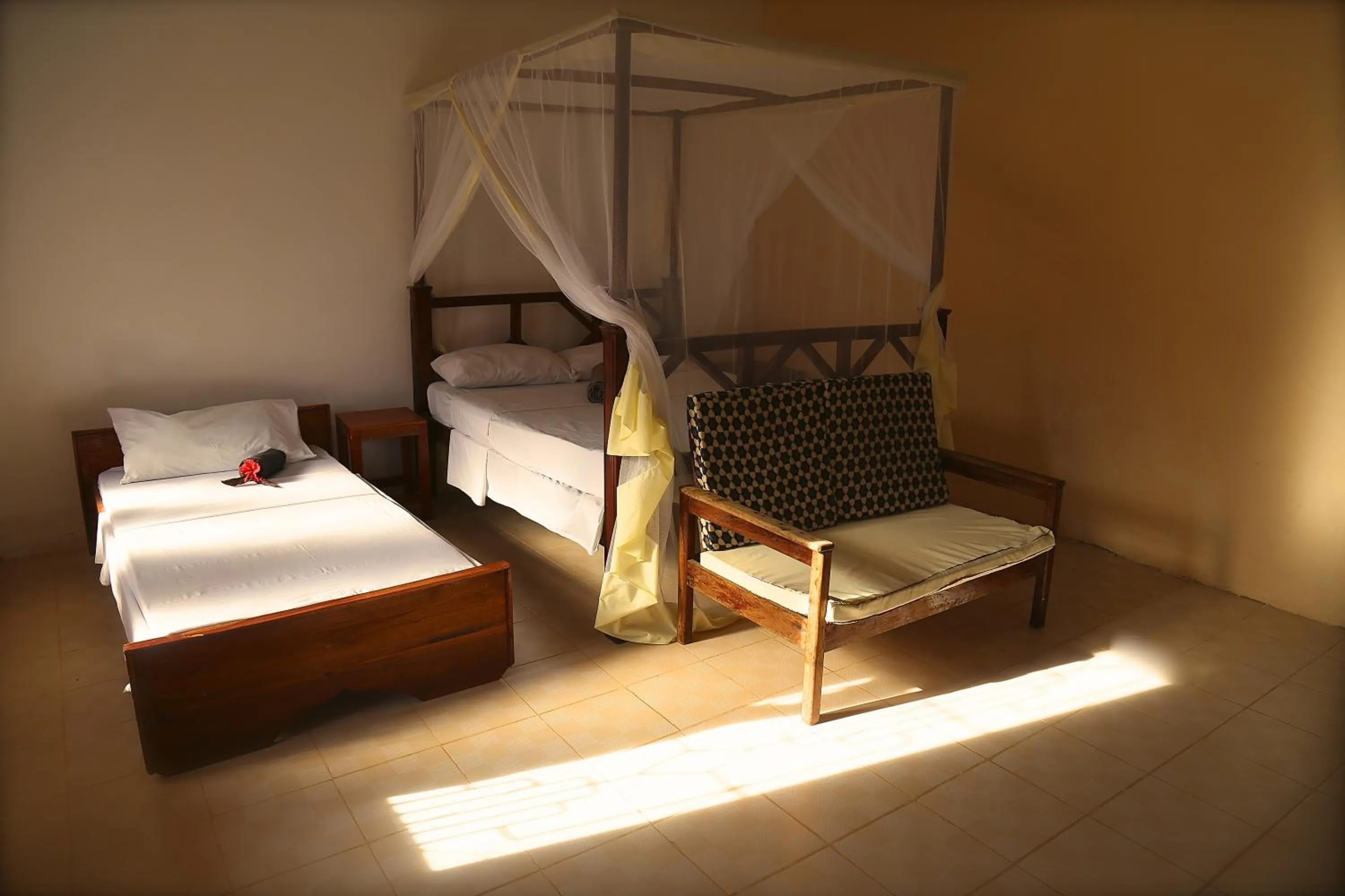 Bed in Kigwedeni Villas