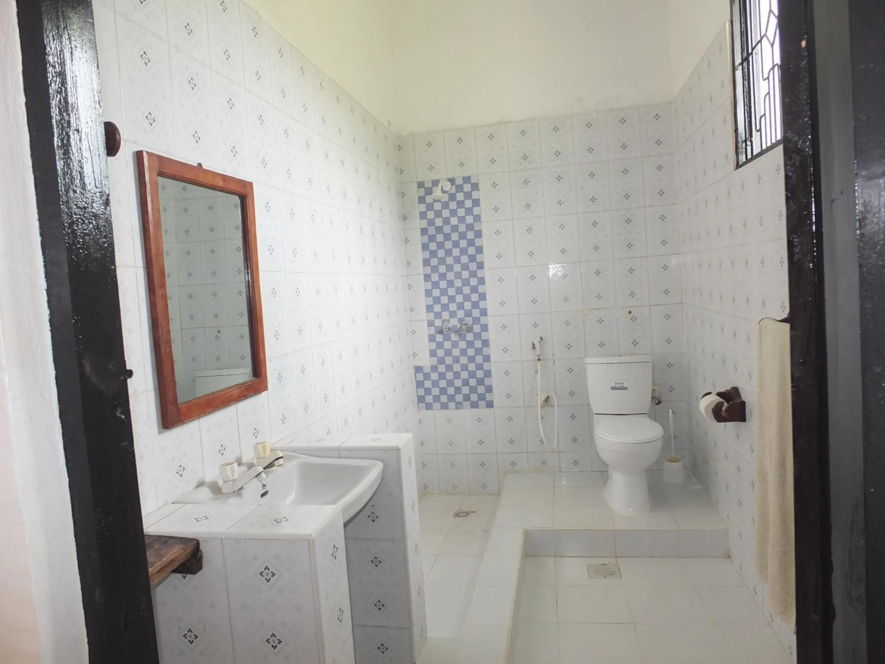 Shower in Kigwedeni Villas