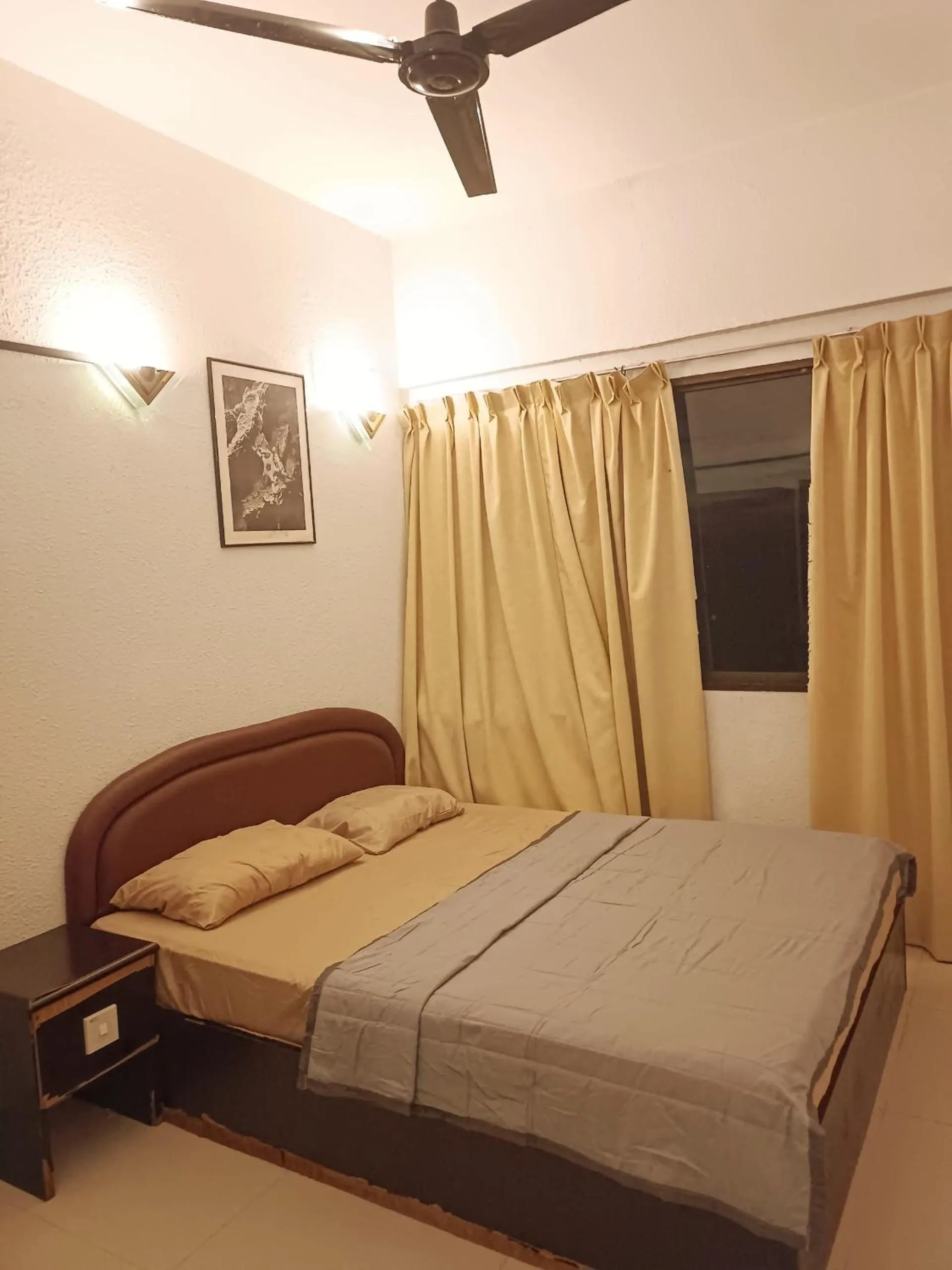 Bed in Sri Sayang Resort Apartment