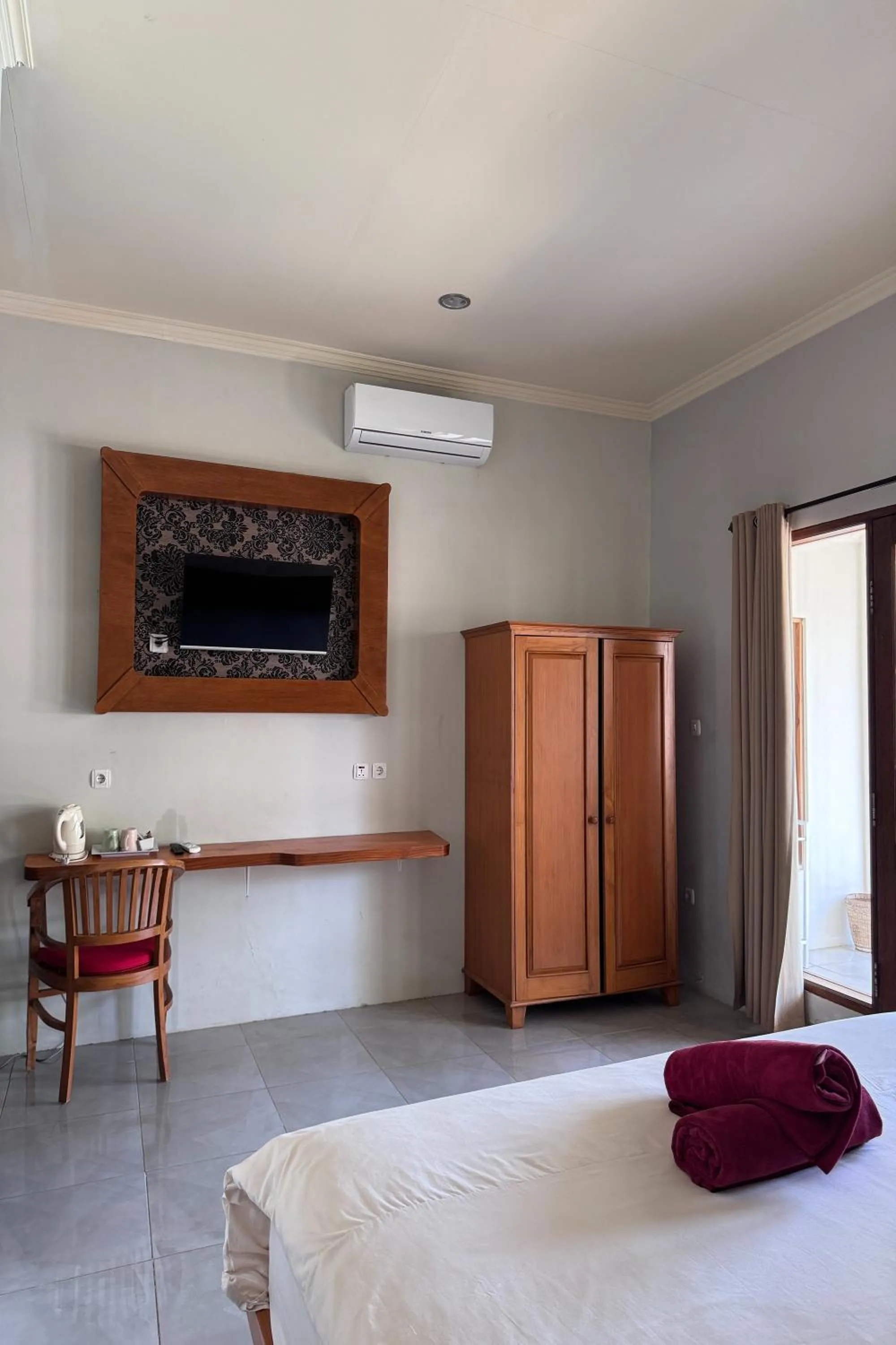 Bed in Senggigi Cottages Lombok