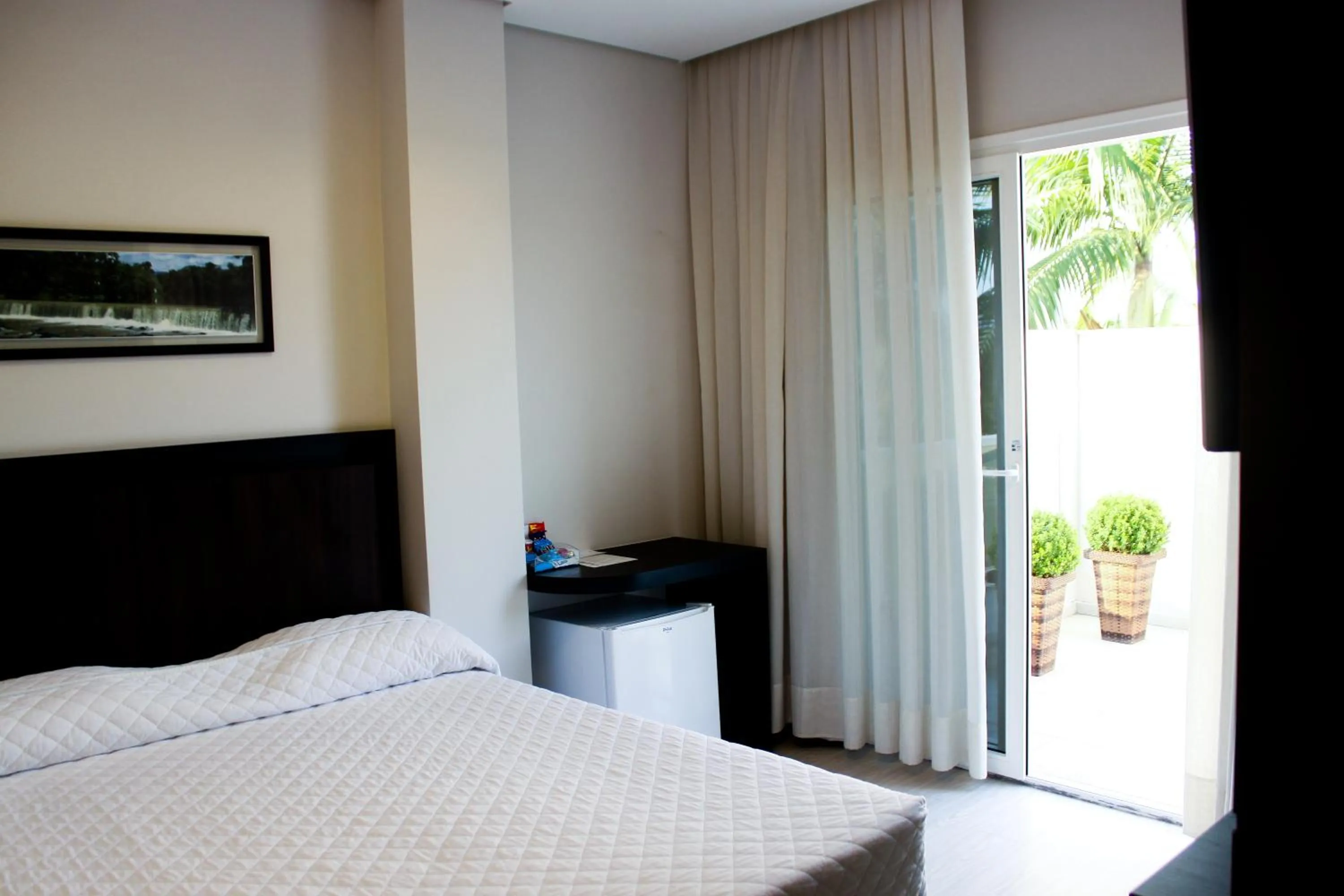 Balcony/Terrace, Bed in Blue Hill Hotel