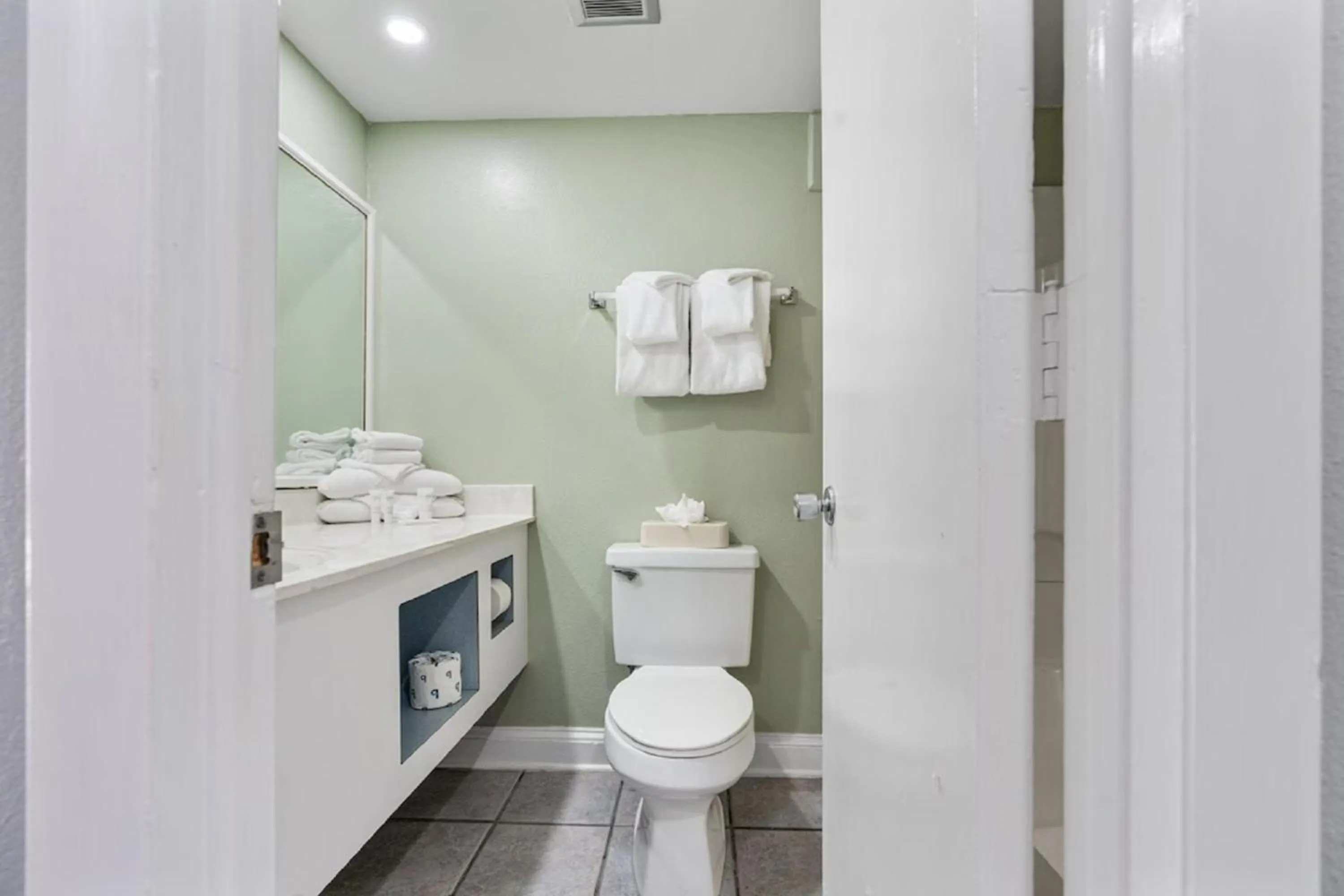 Bathroom in Capital O Sunset Waves Hotel Myrtle Beach Oceanfront