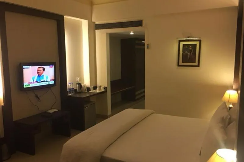 Bed in Shiva Oasis Resort